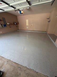 Garage painted with epoxy floor done in July 2026