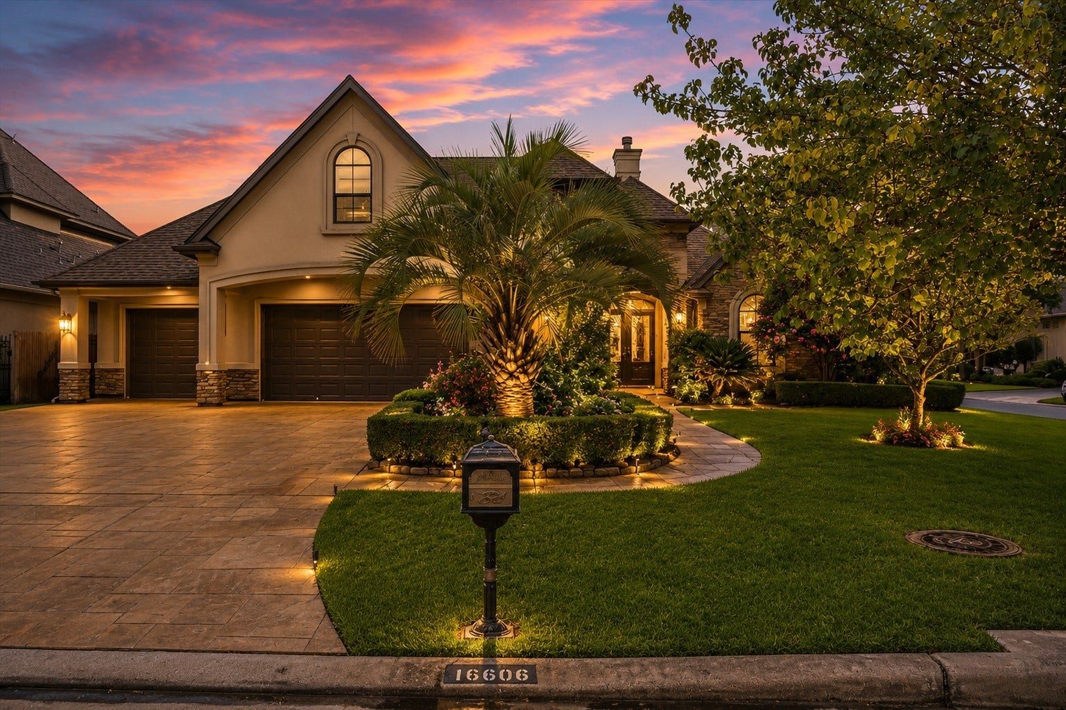 16606 Bridge Creek Falls Court, Spring, TX 77379 Stunning stone and stucco elevation with exceptional curb appeal, featuring lush professional landscaping, a manicured lawn, elegant palm trees, a three-car garage, and a welcoming covered entry that makes a lasting first impression.
