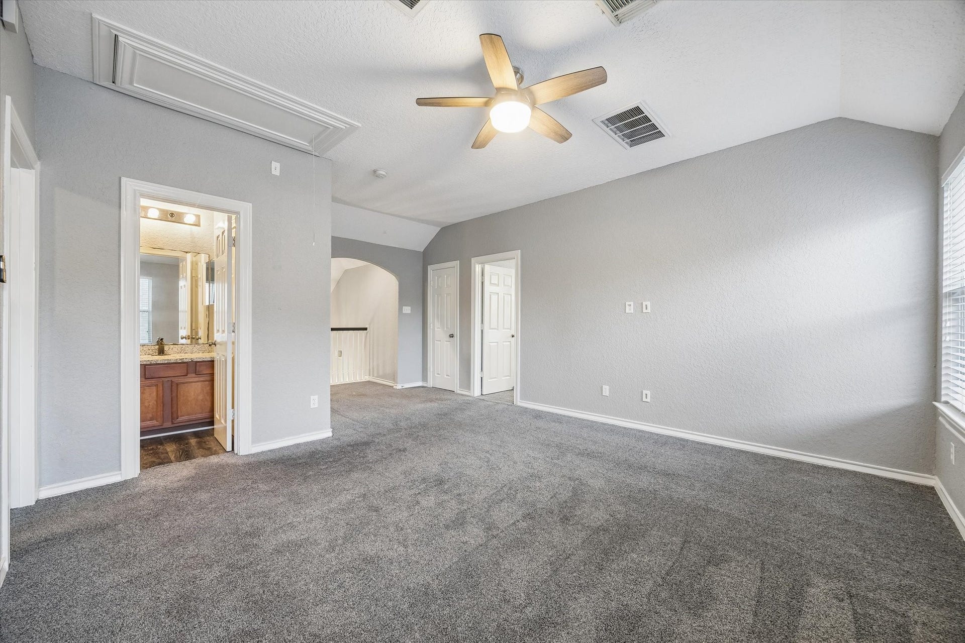 5115 Redleaf Forest Lane, Katy, TX 77494 The oversized upstairs game room offers plenty of space for a media room, playroom, or second living area. Featuring vaulted ceilings and a convenient full bathroom, this versatile space can easily accommodate a variety of needs.