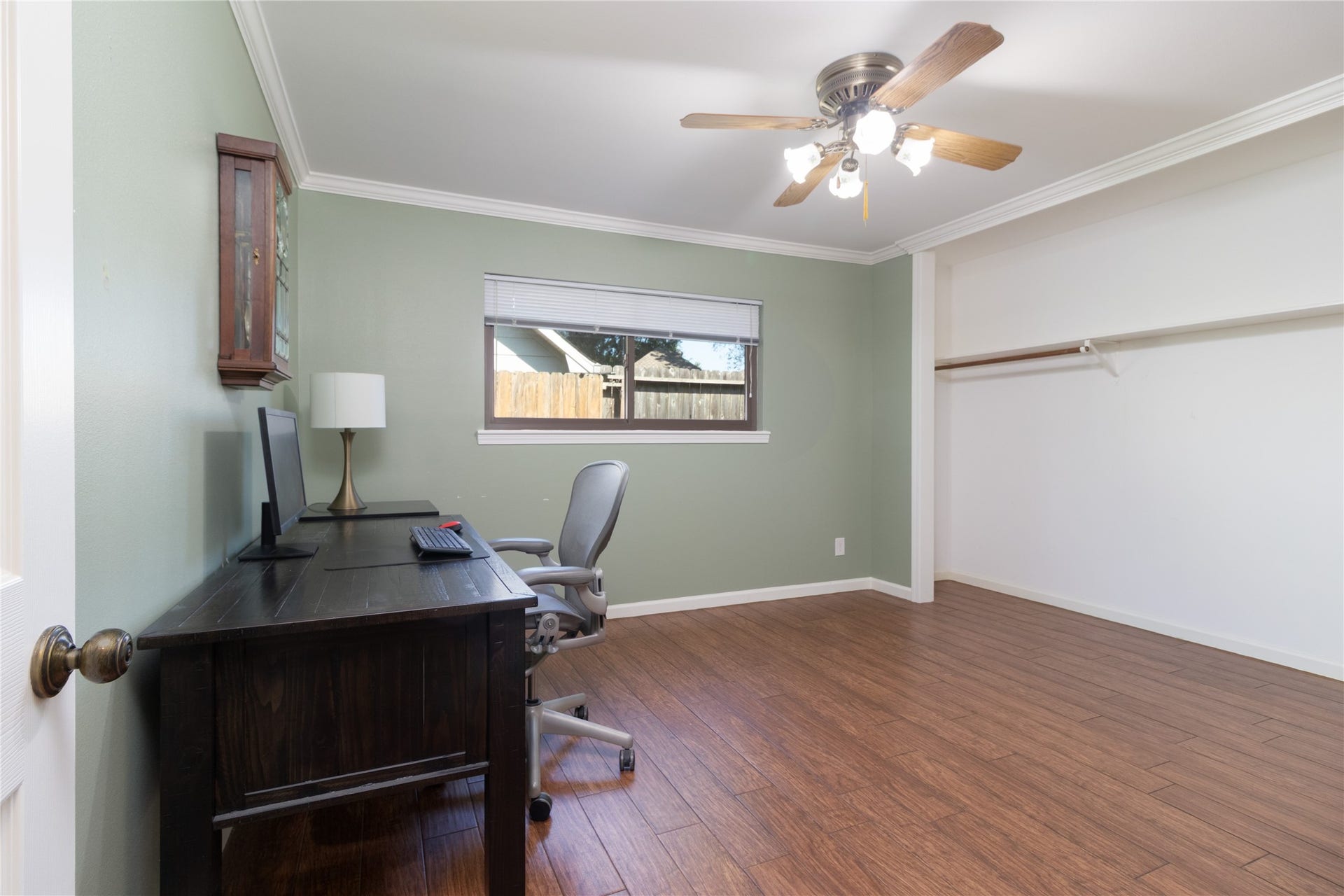 8919 Manhattan Drive, Houston, TX 77096 Flexible bedroom currently functions beautifully as a home office.