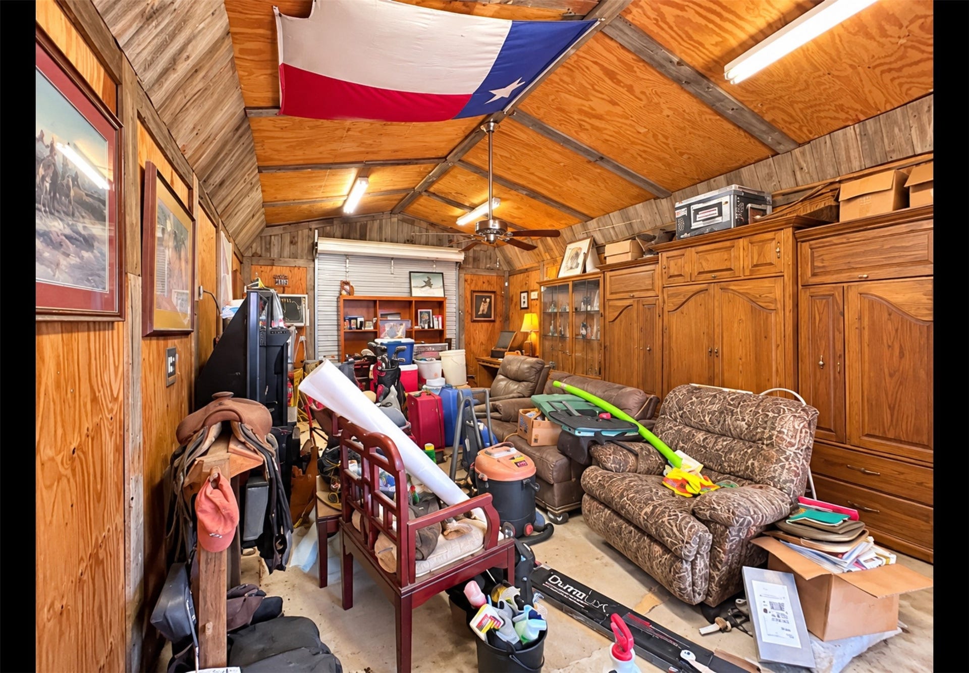 516 N Shirley Street, Alvin, TX 77511 Opportunity to have this man cave or workshop once it is cleaned up.