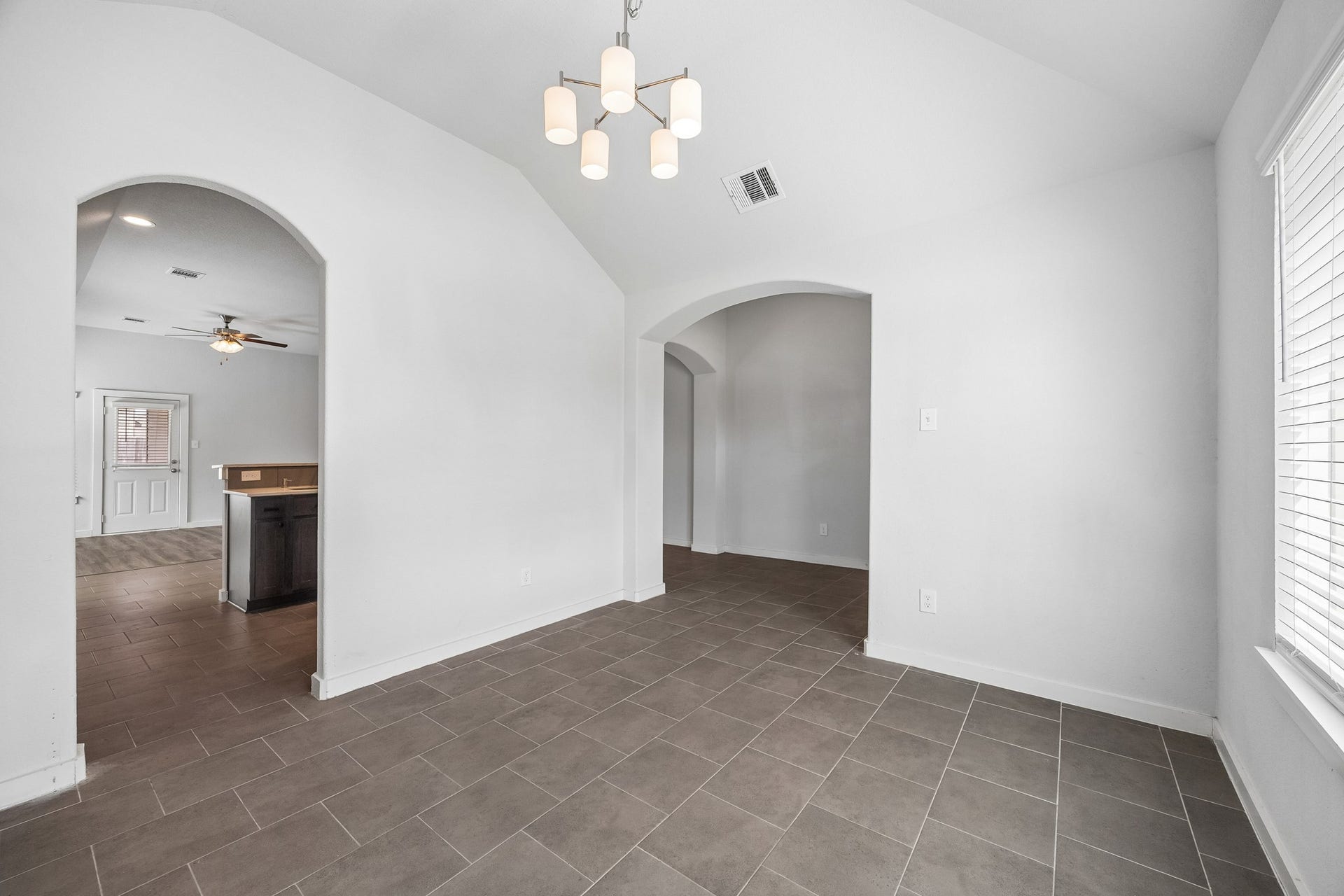 This spacious room located at the front of the home easily flows into the main living areas creating easy open concept living.