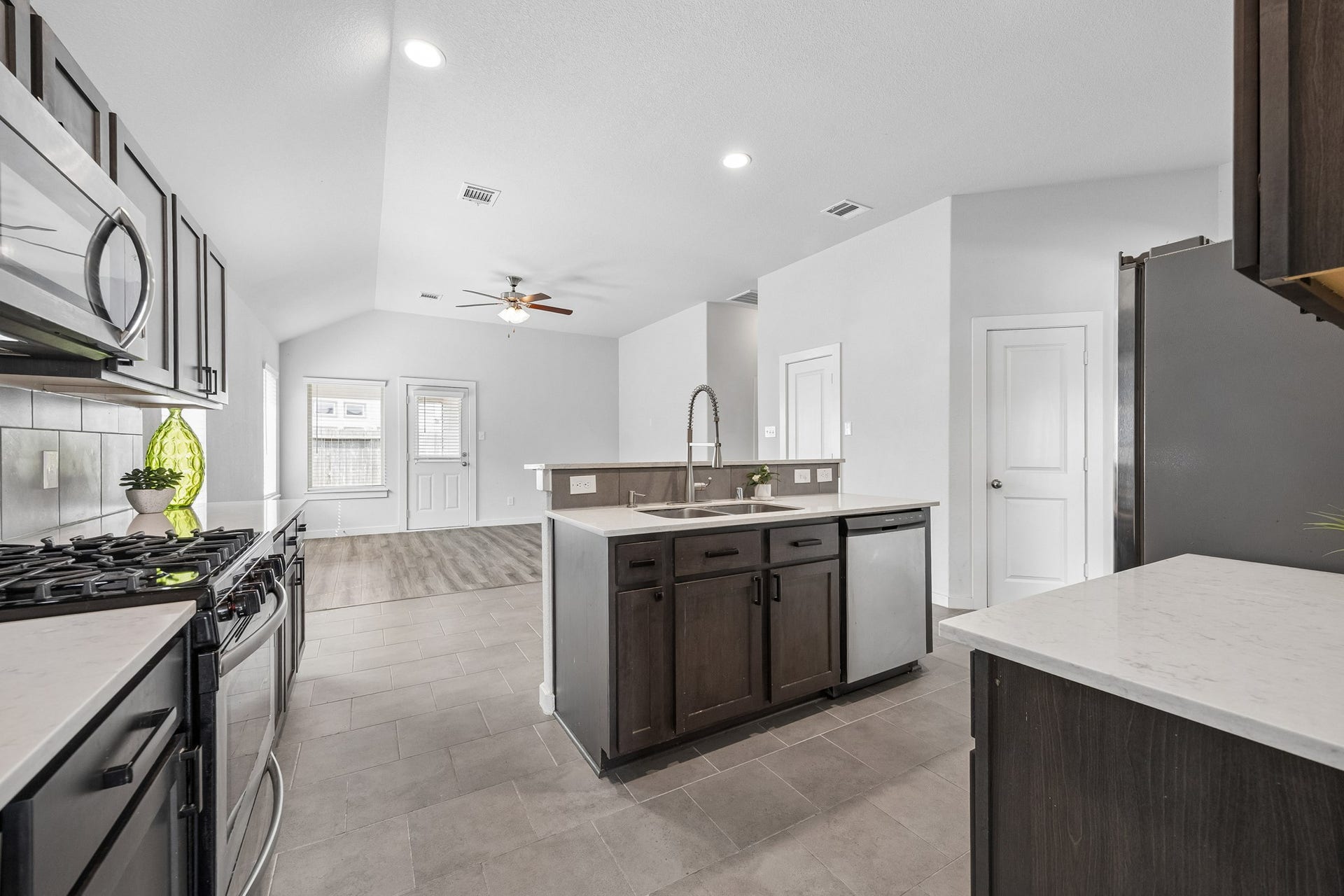 High and vaulted ceilings enhance the beauty of the home.