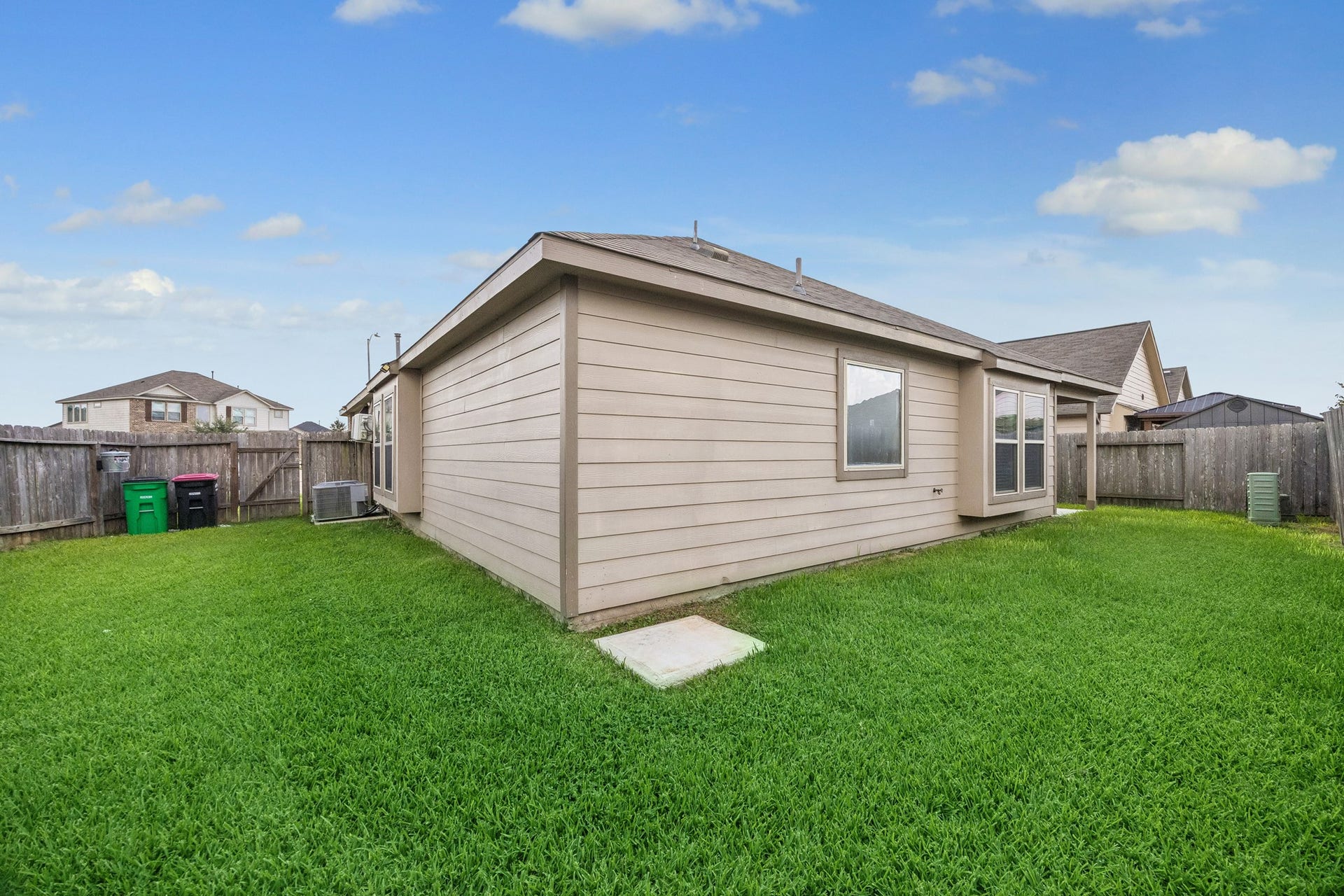 Enjoy the green on all sides of the home. Home backs to green space.