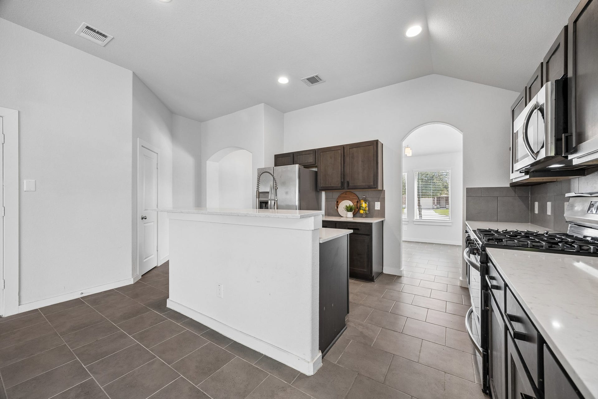 The Neutral and warm color pallet welcome a decorators touch. Oh the possibilities.