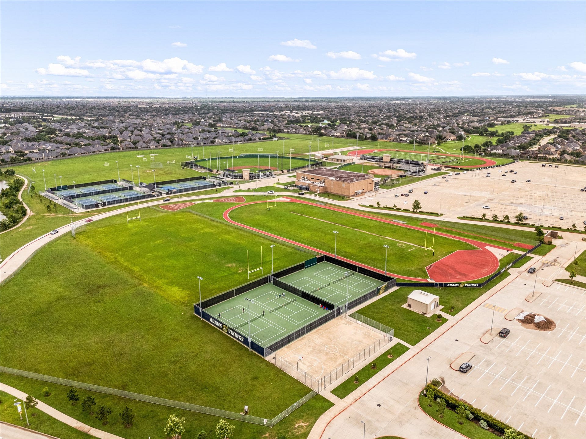 4103 August Light Court, Fulshear, TX 77441 From Friday night lights to tennis matches and track meets, you'll love being so close that you'll never miss a moment.