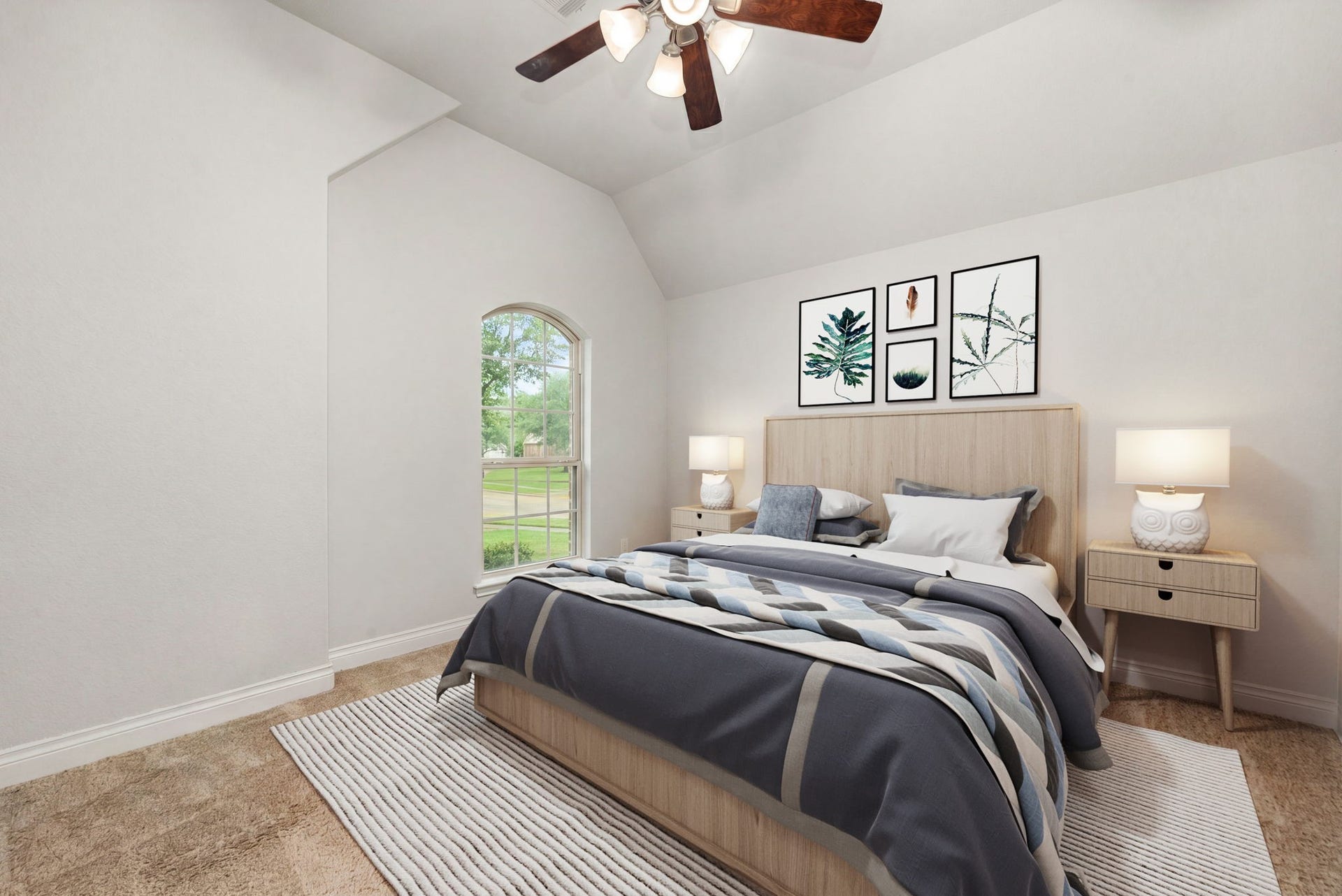 4103 August Light Court, Fulshear, TX 77441 A striking, vaulted ceiling detail elevates the room's architecture, adding incredible height and a spacious feel anchored by a wood-blade center ceiling fan. An elegant arched picture window frames peaceful views of the surrounding outdoor landscape while welcoming in soft, natural light. *Virtually Staged