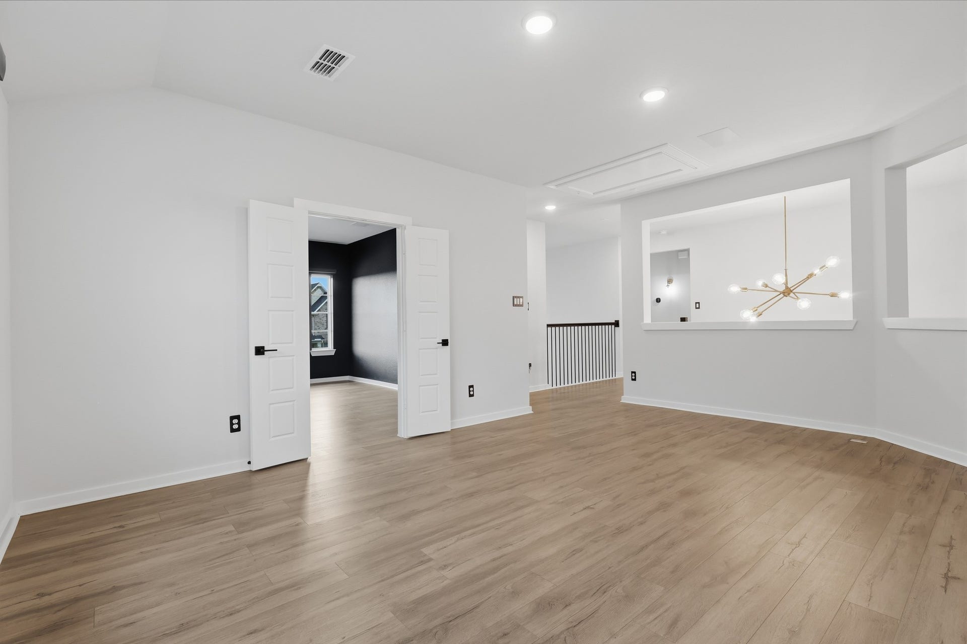 31539 Beacon Cove Trail, Fulshear, TX 77441 Its central location creates an easy connection between the upstairs bedrooms and dedicated media room.