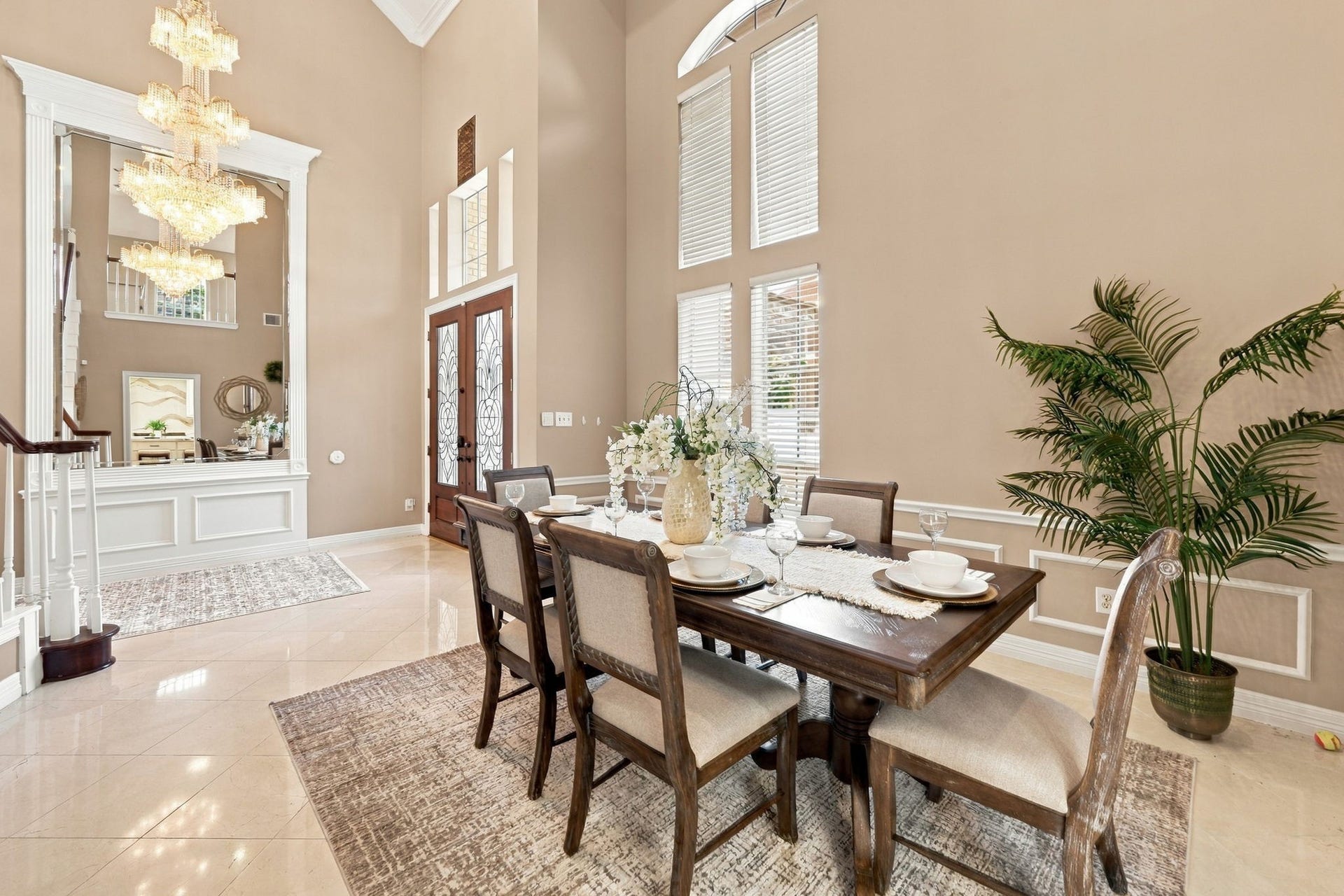 7610 Northwoods Drive, Sugar Land, TX 77479 Just beyond the entry, the formal dining room creates an impressive setting for holiday dinners, celebrations and memorable evenings with family and friends.