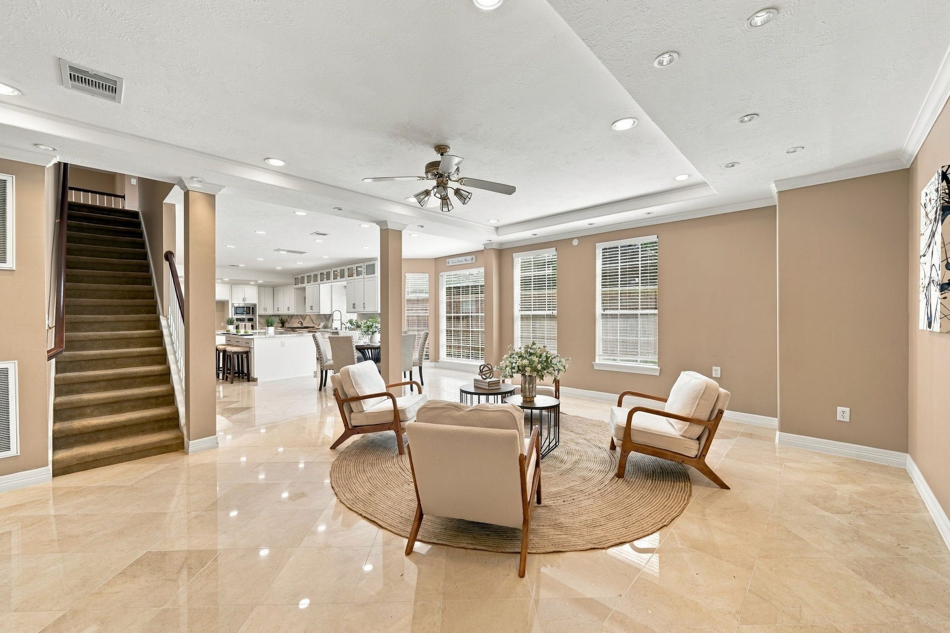 7610 Northwoods Drive, Sugar Land, TX 77479 Set beside the kitchen, this flexible sitting area offers a comfortable place for casual conversation.
