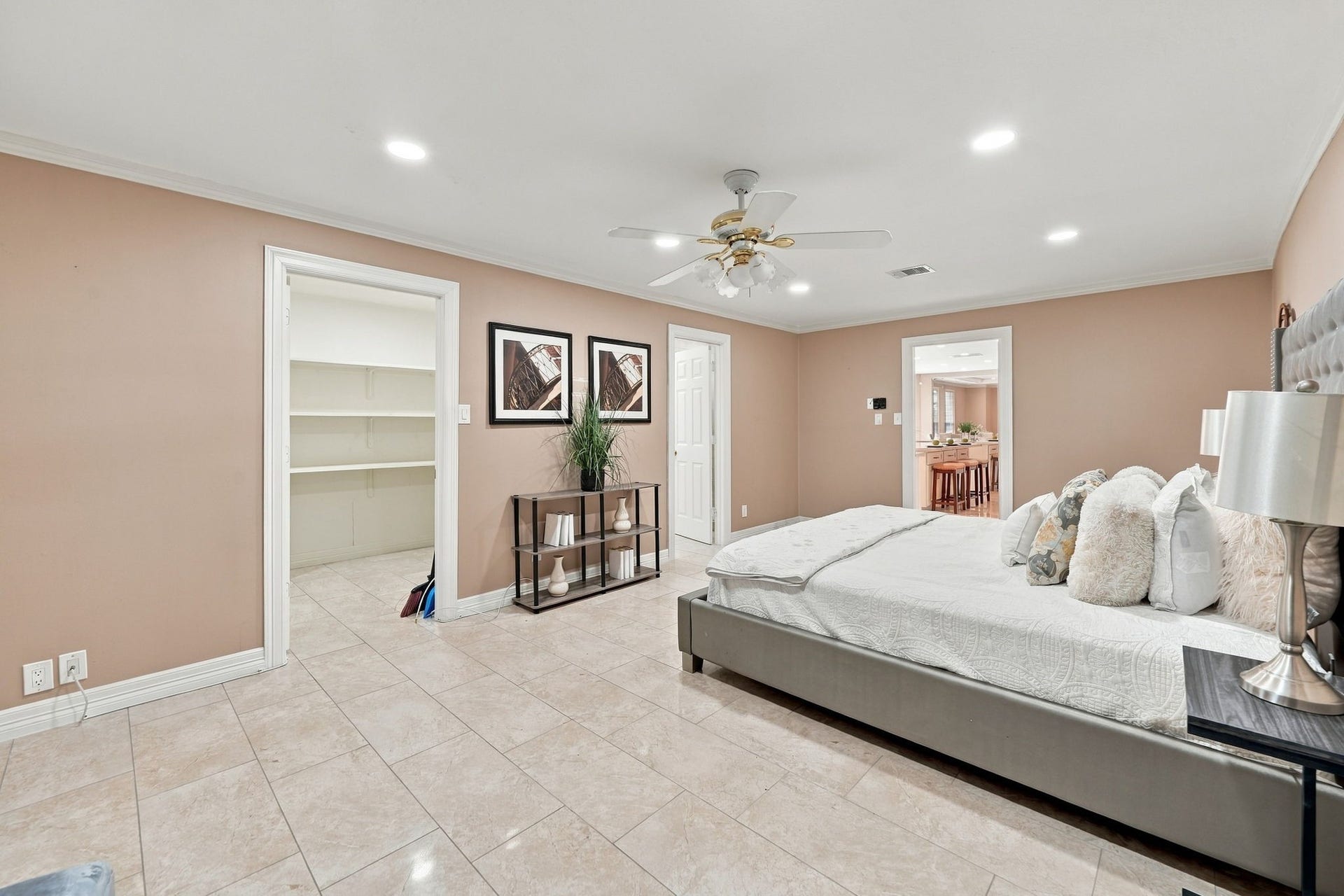 7610 Northwoods Drive, Sugar Land, TX 77479 Added storage gives Bedroom 1 everyday practicality, while its placement near the main living spaces makes it ideal for family or overnight guests.