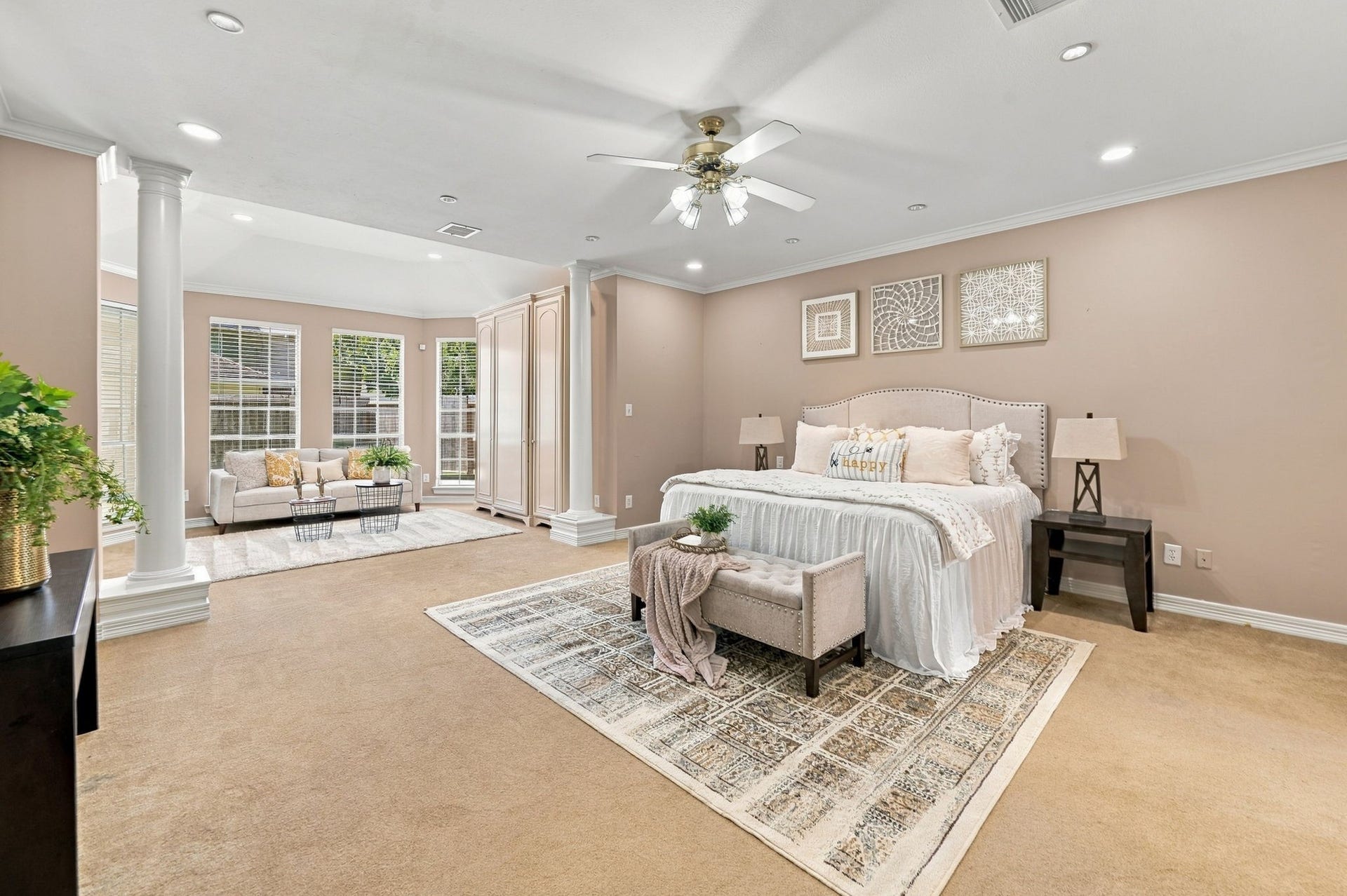 7610 Northwoods Drive, Sugar Land, TX 77479 An expansive primary suite offers exceptional room for a separate sitting area, creating a private space to relax beyond the bedroom.