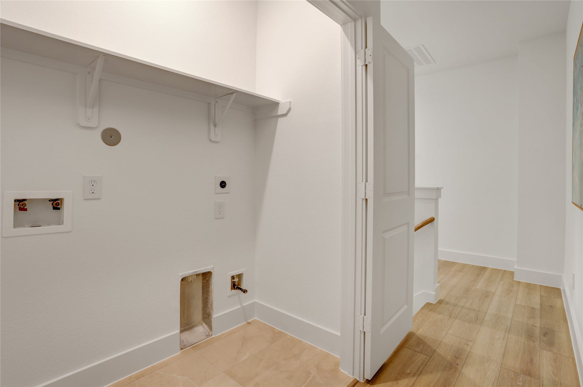 9610 Burden Street, Houston, TX 77093 The 3x6 utility room has tile floor and built in shelf.