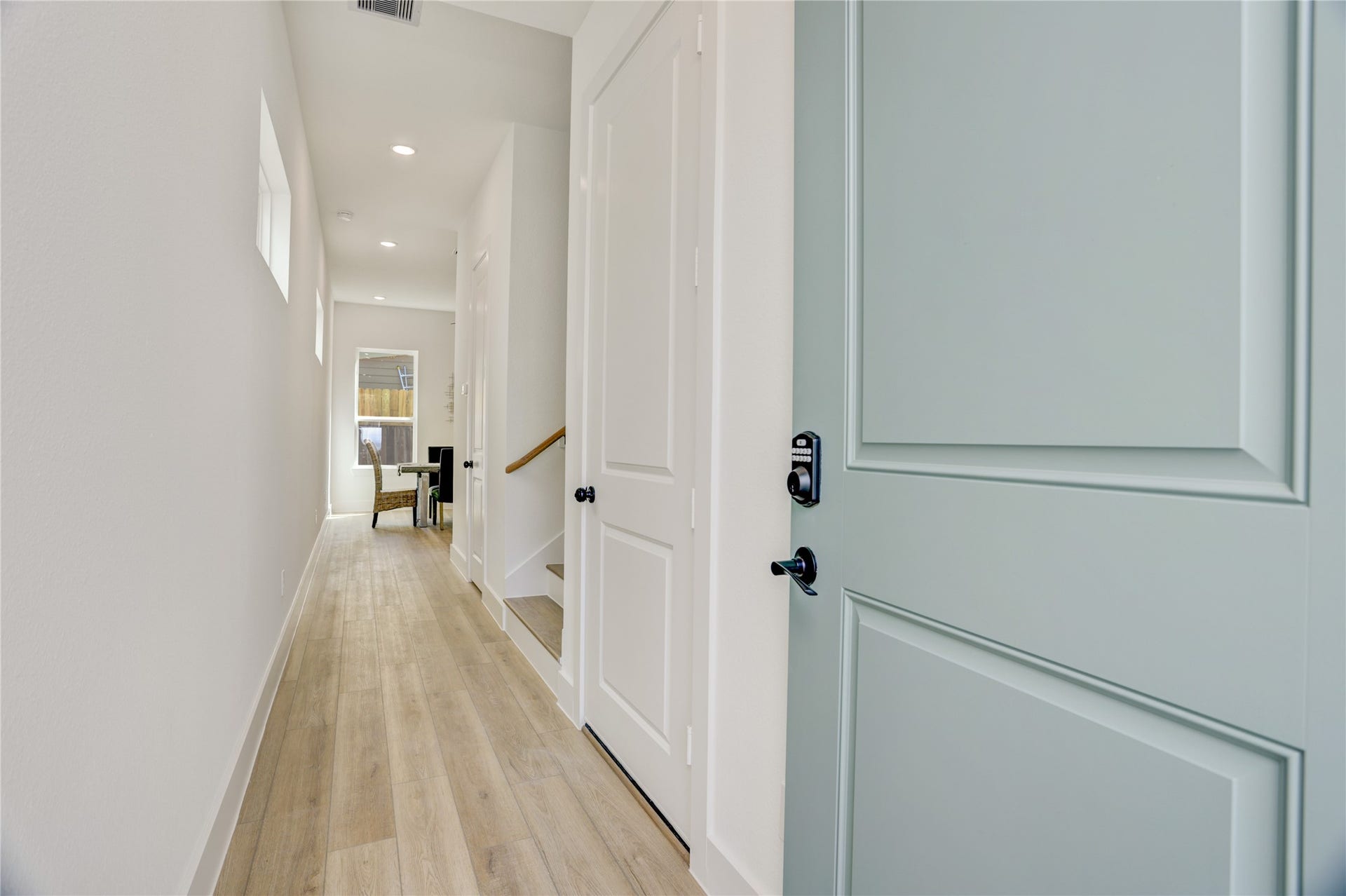 9610 Burden Street, Houston, TX 77093 Upon entering, the home has a long gallery hallway - perfect for displaying artwork.