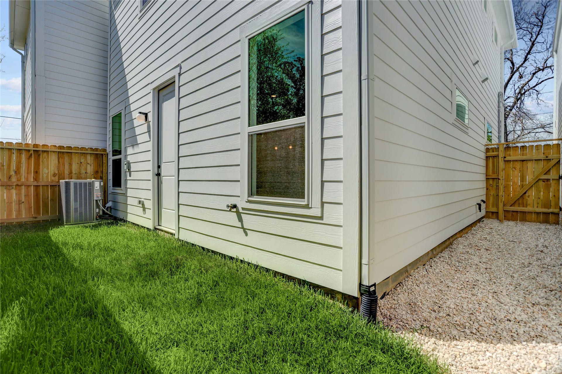 9610 Burden Street, Houston, TX 77093 The home has a fully fenced low maintenance green space and gravel side yard.
