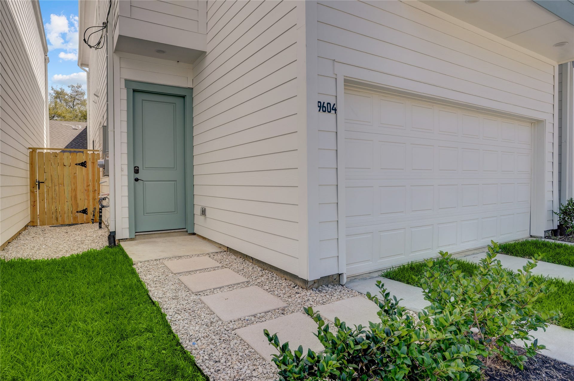 9610 Burden Street, Houston, TX 77093 The home has a covered front entry and solid front door.