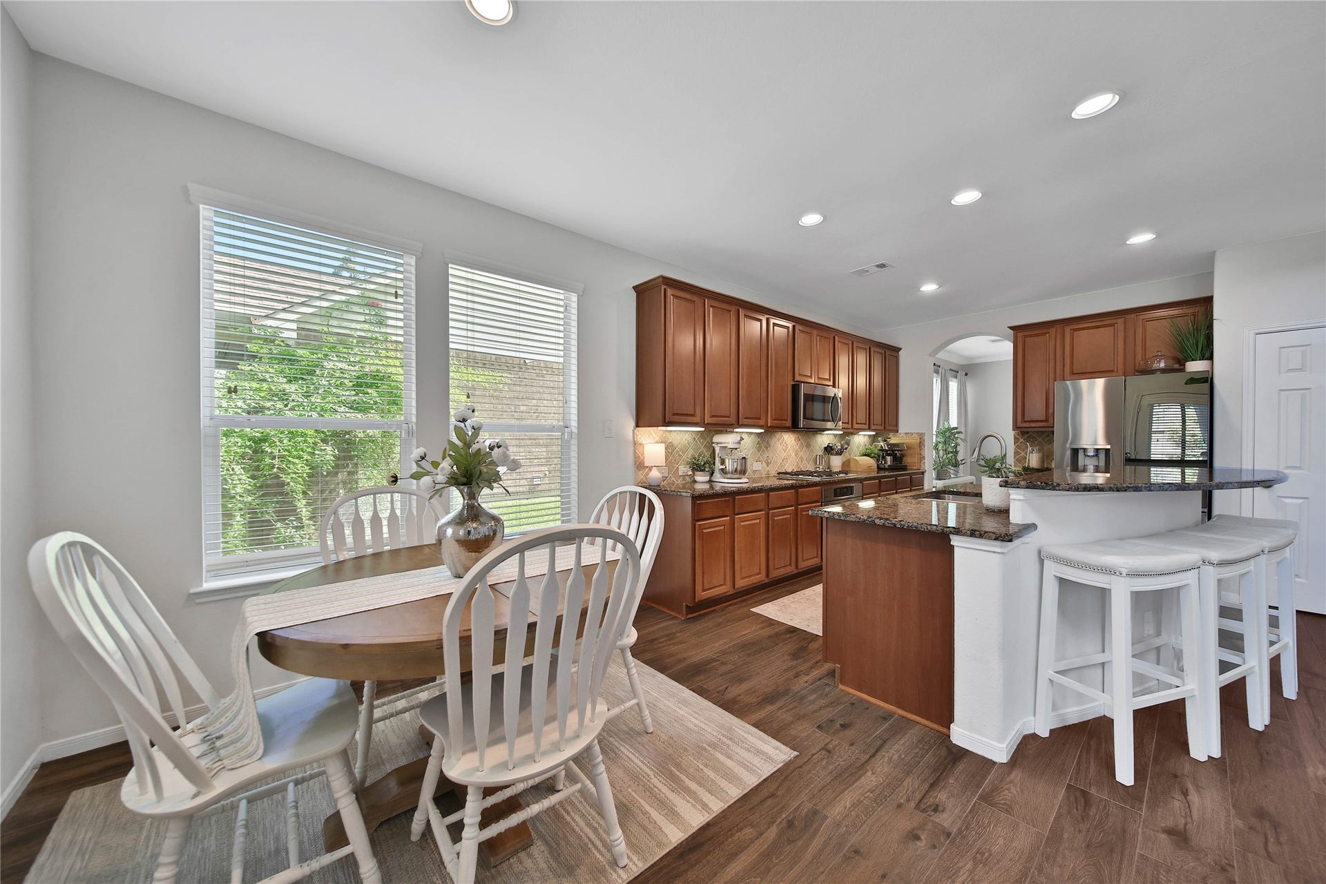 17311 Lassen Forest Lane, Humble, TX 77346 The breakfast nook is tucked off the kitchen and has access to the covered patio.