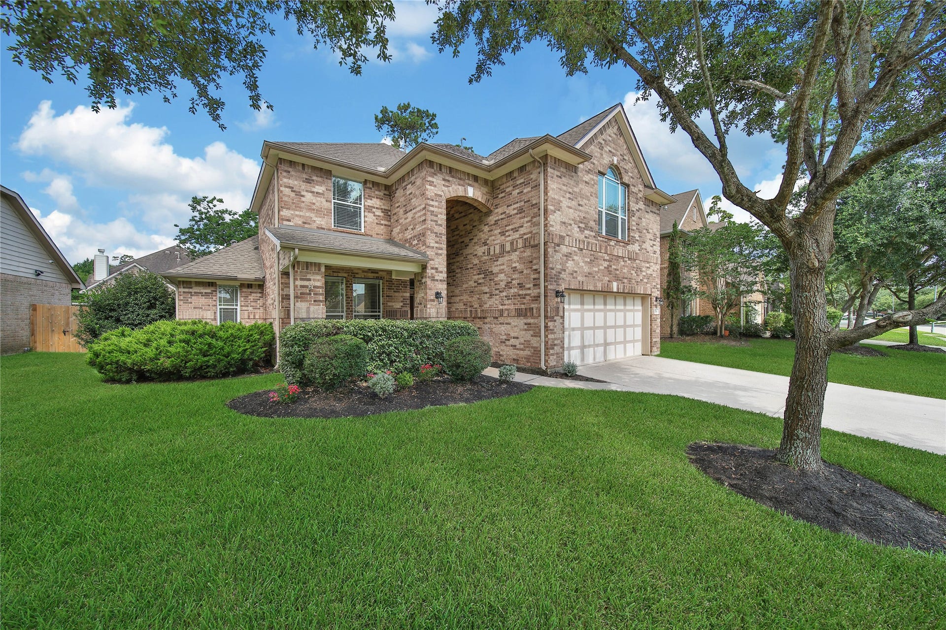 17311 Lassen Forest Lane, Humble, TX 77346 Welcoming facade and covered front porch greet you. This homes facade is all brick and the rear of this home is all brick.