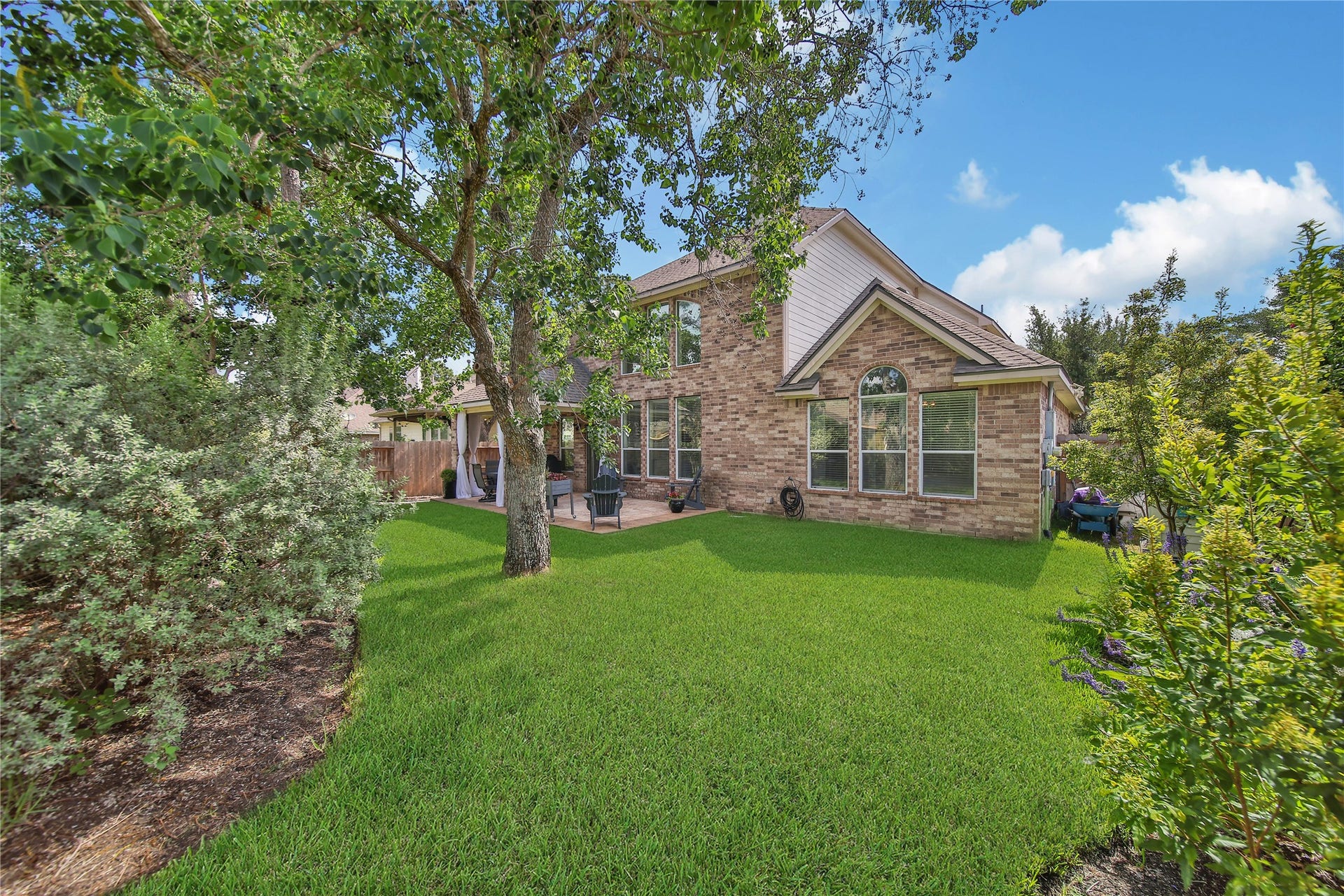 17311 Lassen Forest Lane, Humble, TX 77346 This backyard is just the right size to enjoy but not too much to maintain. Mature trees and shrubs add to this yards beauty.