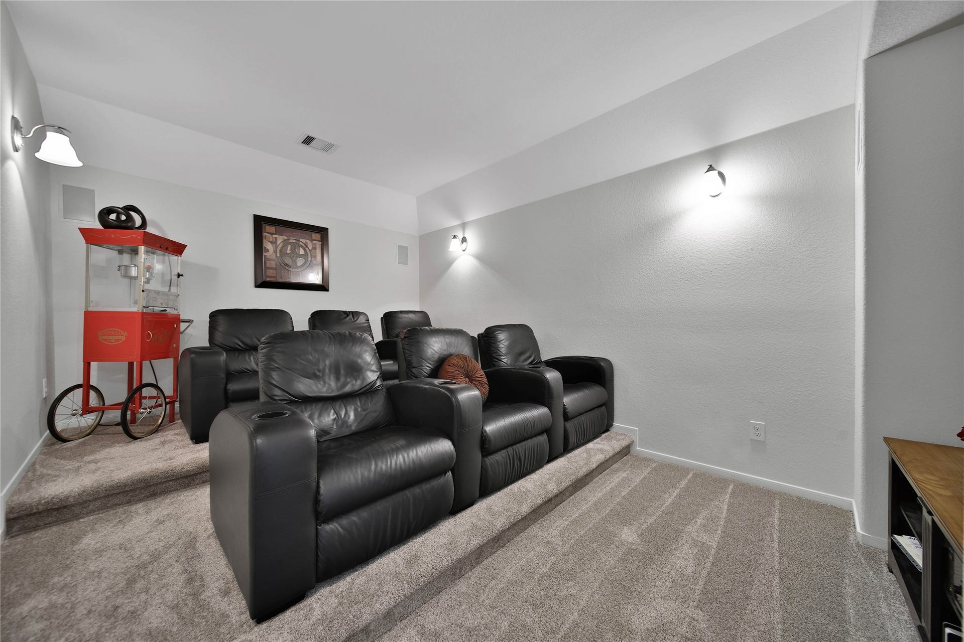 17311 Lassen Forest Lane, Humble, TX 77346 This home is outfitted with a media / theater room! Enjoy your favorite movies here! Plush carpeting replaced in 2022. Risers provide a place for your favorite seating.
