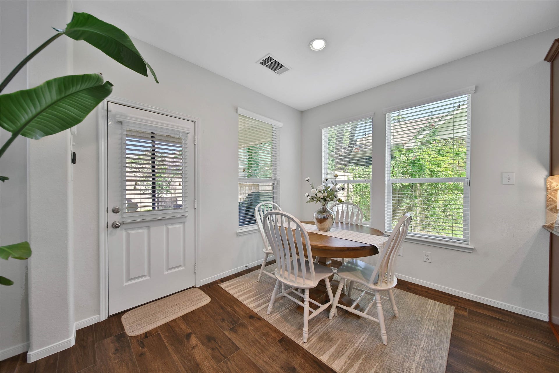 17311 Lassen Forest Lane, Humble, TX 77346 The sunny Breakfast nook has views of the lush backyard and has access to the covered back patio.