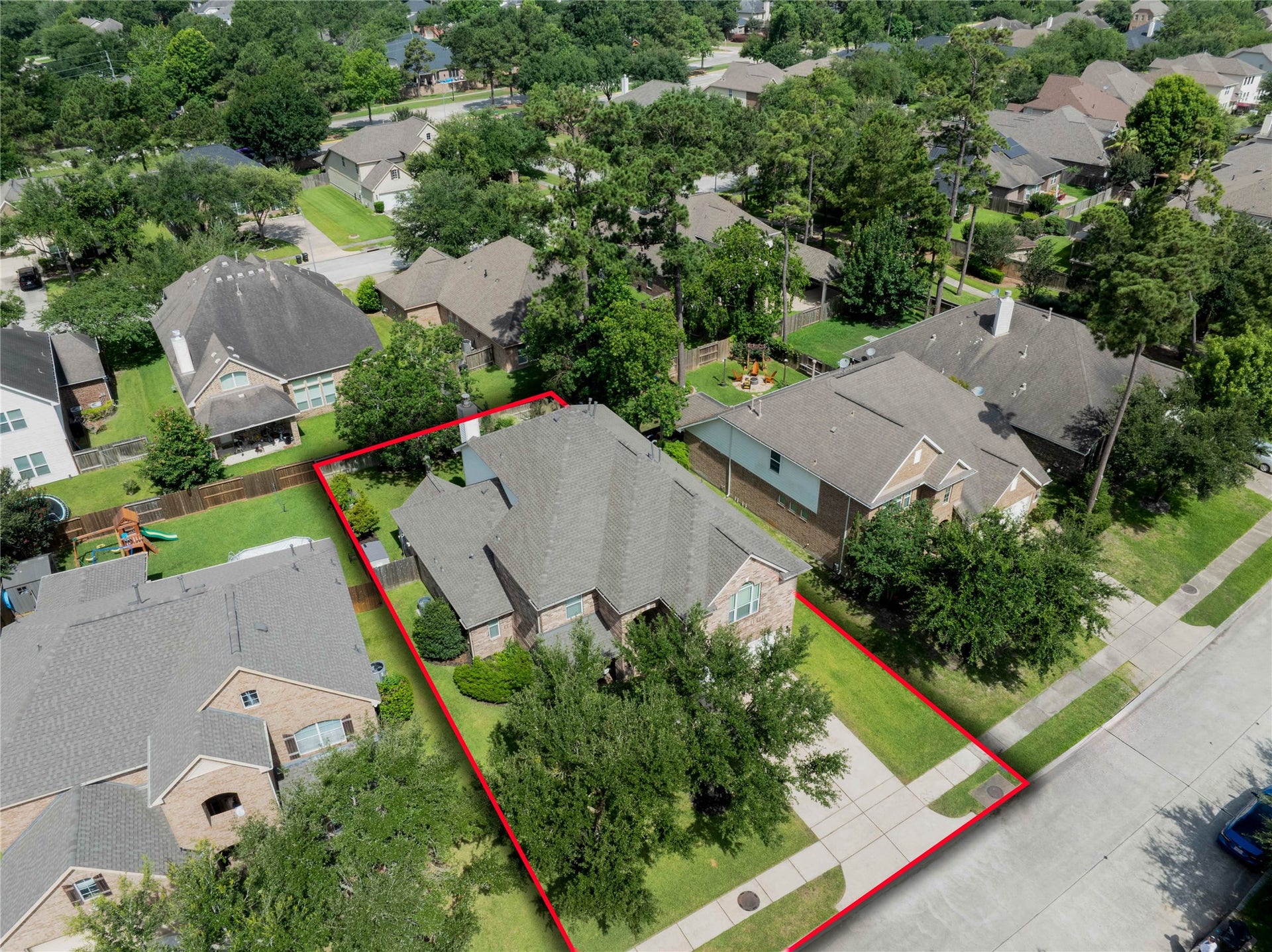 17311 Lassen Forest Lane, Humble, TX 77346 Aerial of front of the property. This energy efficient home has a brand new roof 5/2026. The attic has a tech-shield radiant barrier. HVAC has been upgraded too.