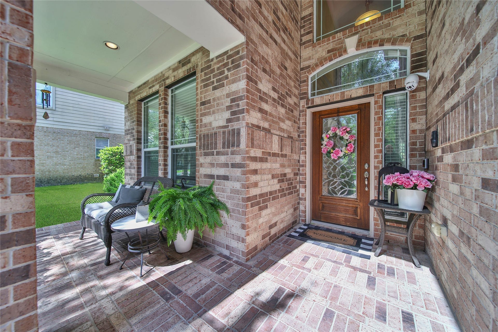 17311 Lassen Forest Lane, Humble, TX 77346 This bright sunny covered front porch is welcoming and a lovely place for a quiet rest. Enjoy a little more privacy as the adjacent houses are a little further away than most subdivision lots.