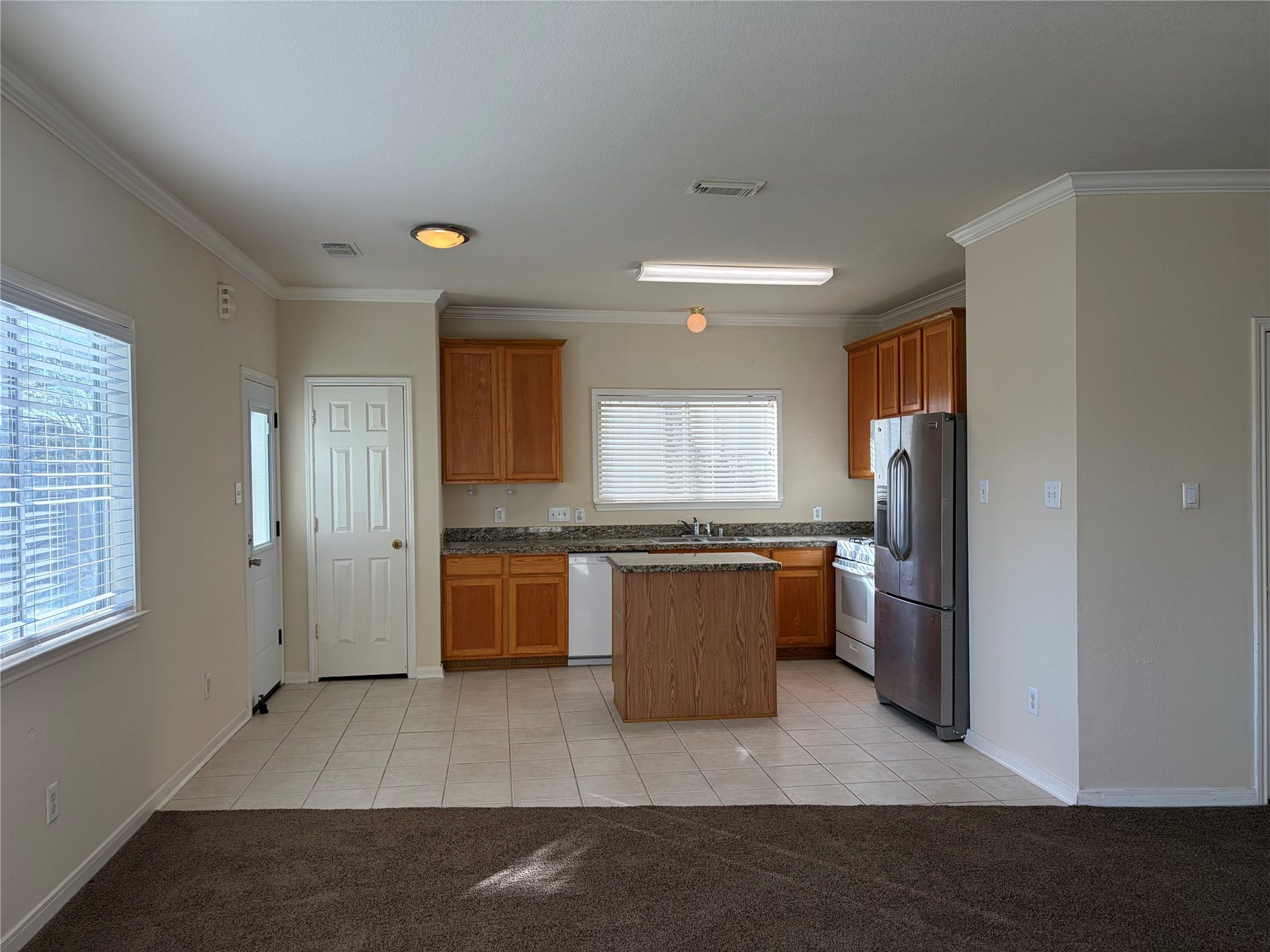 Kitchen opens upt to Living Room