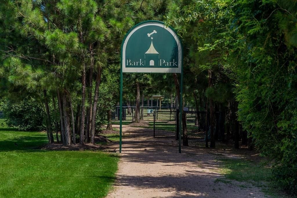 1323 Freshwater Bay Court, Spring, TX 77379 The BARK PARK where our 4-legged family members enjoy a 2.5-acre fenced dog park featuring separate areas for small & large dogs, trails, drinking fountains for pets and shaded seating for their owners.