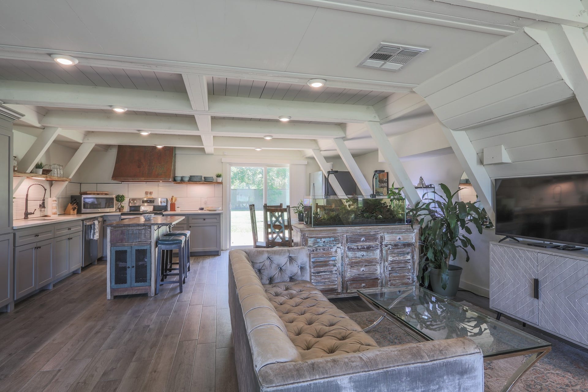 2575 Cliff Drive, Dickinson, TX 77539 As you enter- the living room, dining space and kitchen are all open and connected... great design to entertain family and/or friends. Take note of the Shiplap and Beam construction overhead, painted out a nice soft white with lots of recessed lighting throughout the home.