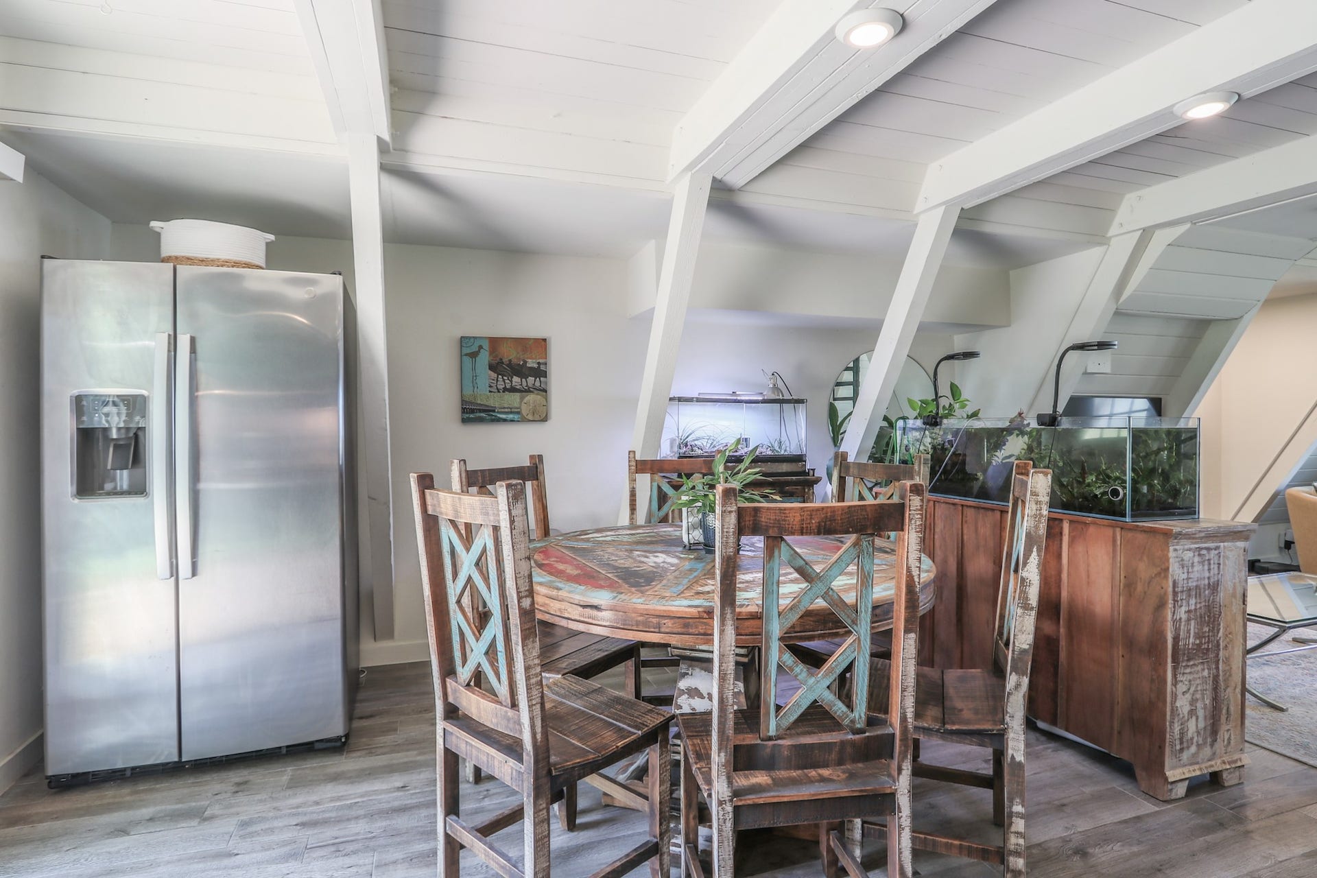 2575 Cliff Drive, Dickinson, TX 77539 The Breakfast Space... The owners are graciously leaving the refrigerator, dining table and 6 chairs as well as a small buffet that matches the set... All of this goes with the island in the kitchen and just looks like it belongs in this fabulous home.