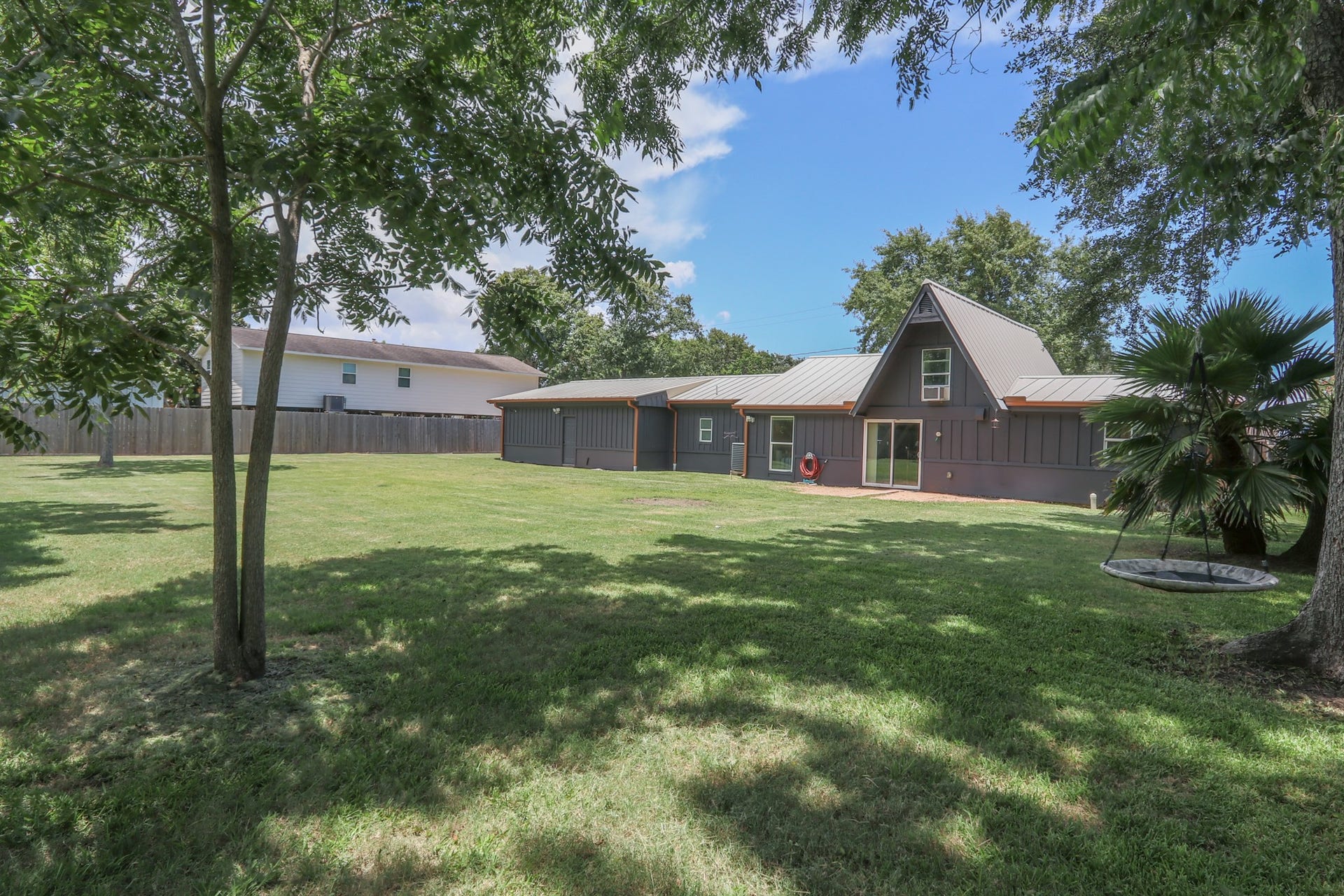 2575 Cliff Drive, Dickinson, TX 77539 Looking back at home from the corner of the yard.