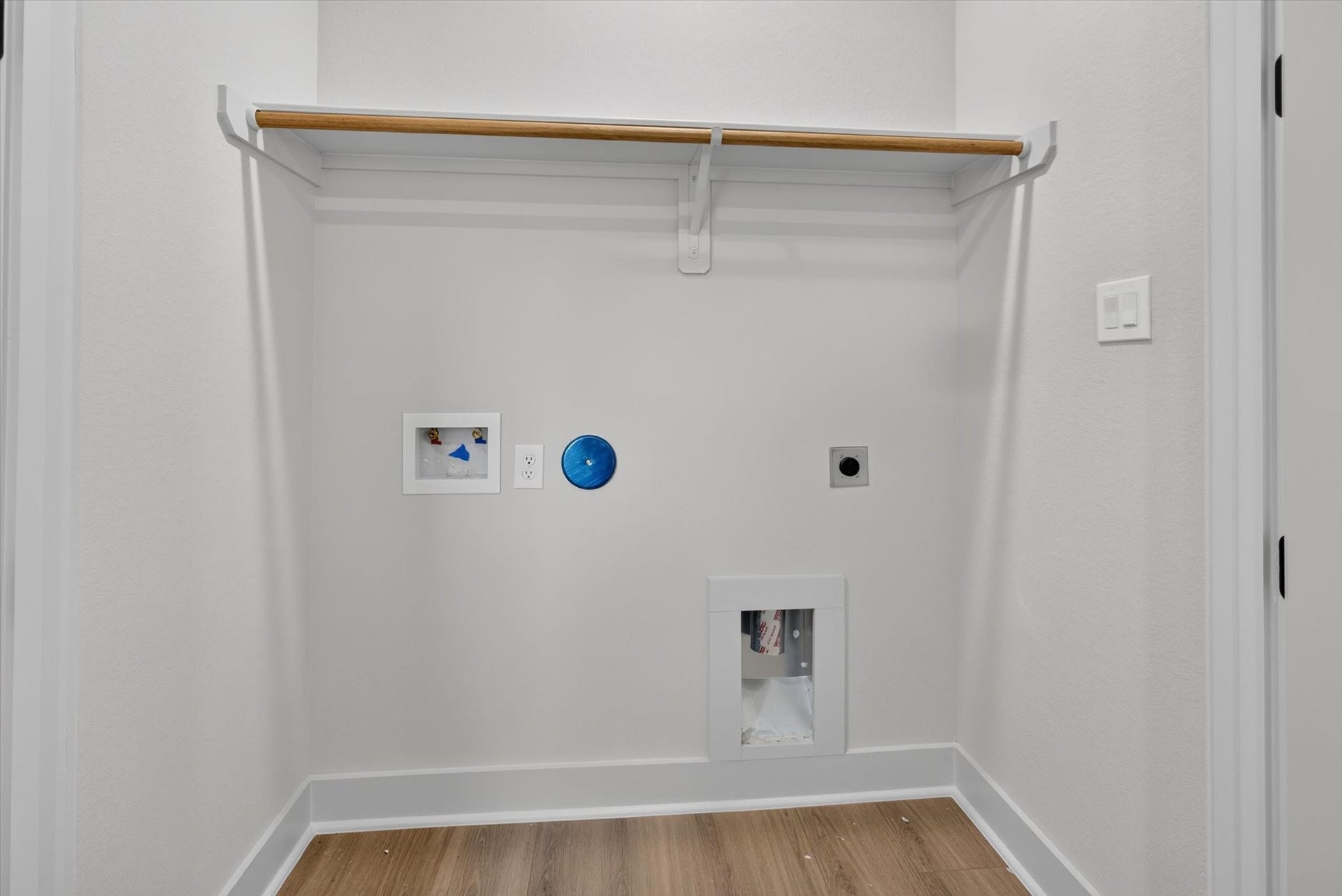 8027 BETTY BOOP Street, Houston, TX 77028 Full sized laundry room with built in shelving.