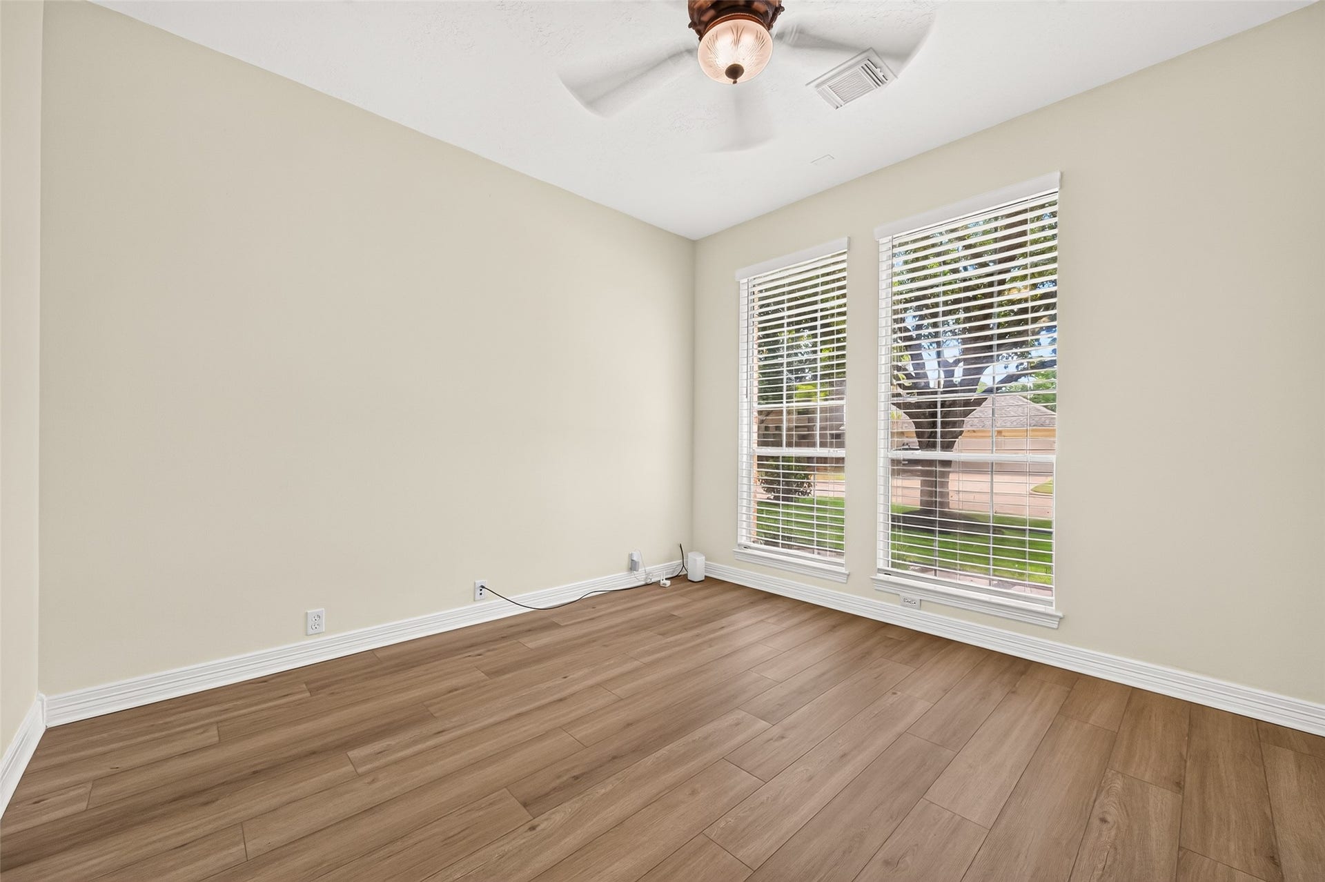 826 Ivory Ridge Lane, Houston, TX 77094 Natural light fills the study through two tall windows overlooking the front yard & mature shade trees. DON'T NEED A STUDY? This versatile room can easily adapt to your needsformal living room, library, music room, hobby/craft room, sports memorabilia room, or simply a comfortable retreat for reading & relaxing. And during the holidays, imagine a beautifully decorated Christmas tree displayed in the front window!