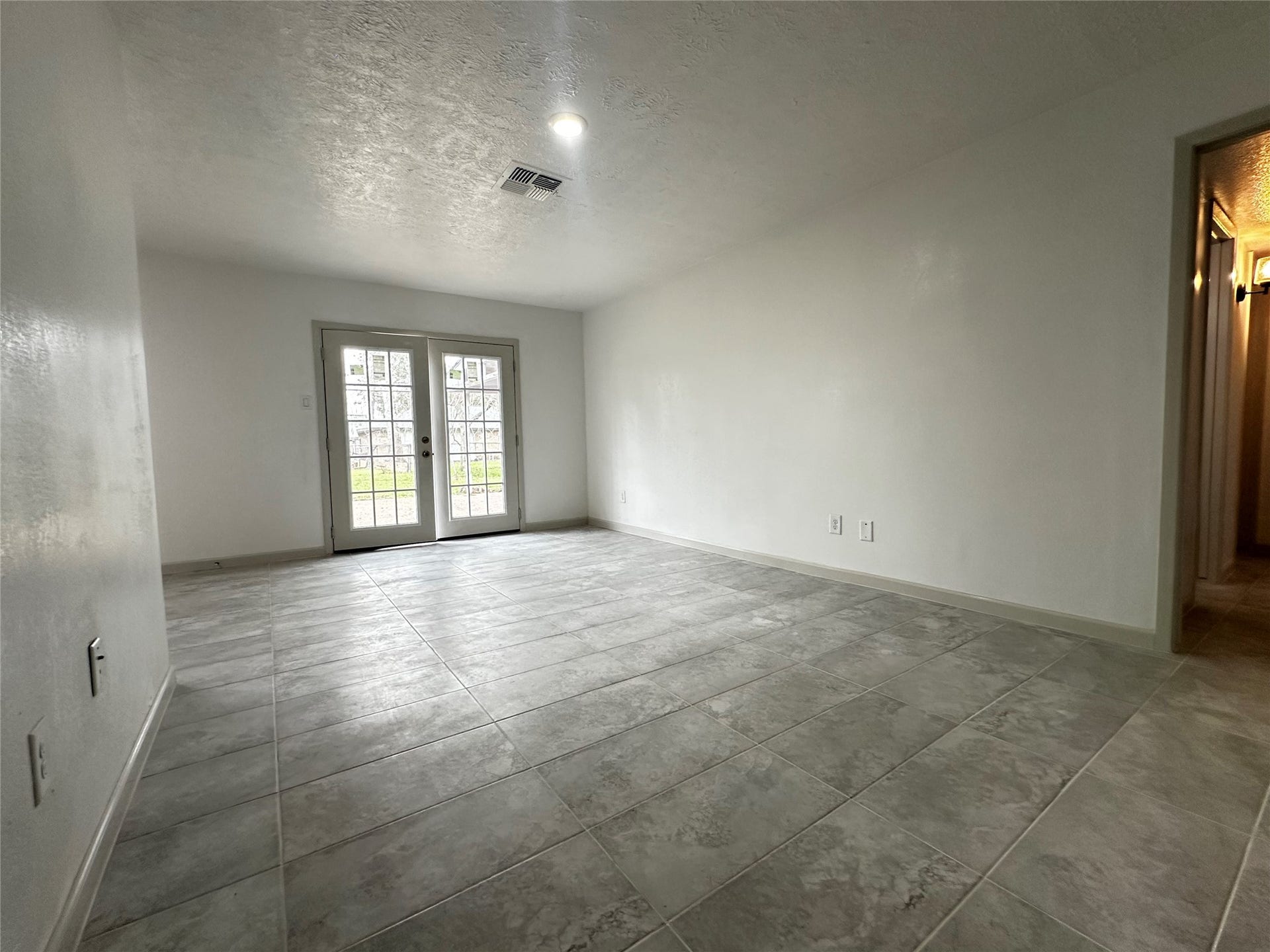 7718 Mosewood Street, Houston, TX 77040 Living Room with French Doors