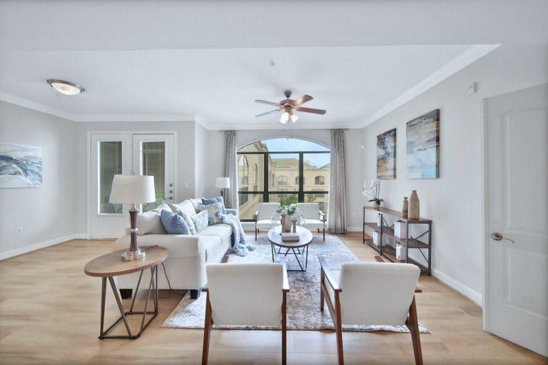 2299 Lone Star Drive, #406, Sugar Land, TX 77479 The view of living W/Elongated windows to invite abundance of nature lights to shine through.