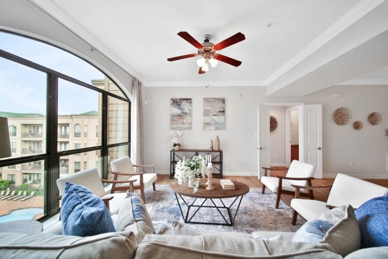 2299 Lone Star Drive, #406, Sugar Land, TX 77479 The other view of living W/Stunning crystal pool views.