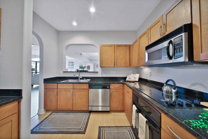 2299 Lone Star Drive, #406, Sugar Land, TX 77479 The other view of kitchen.