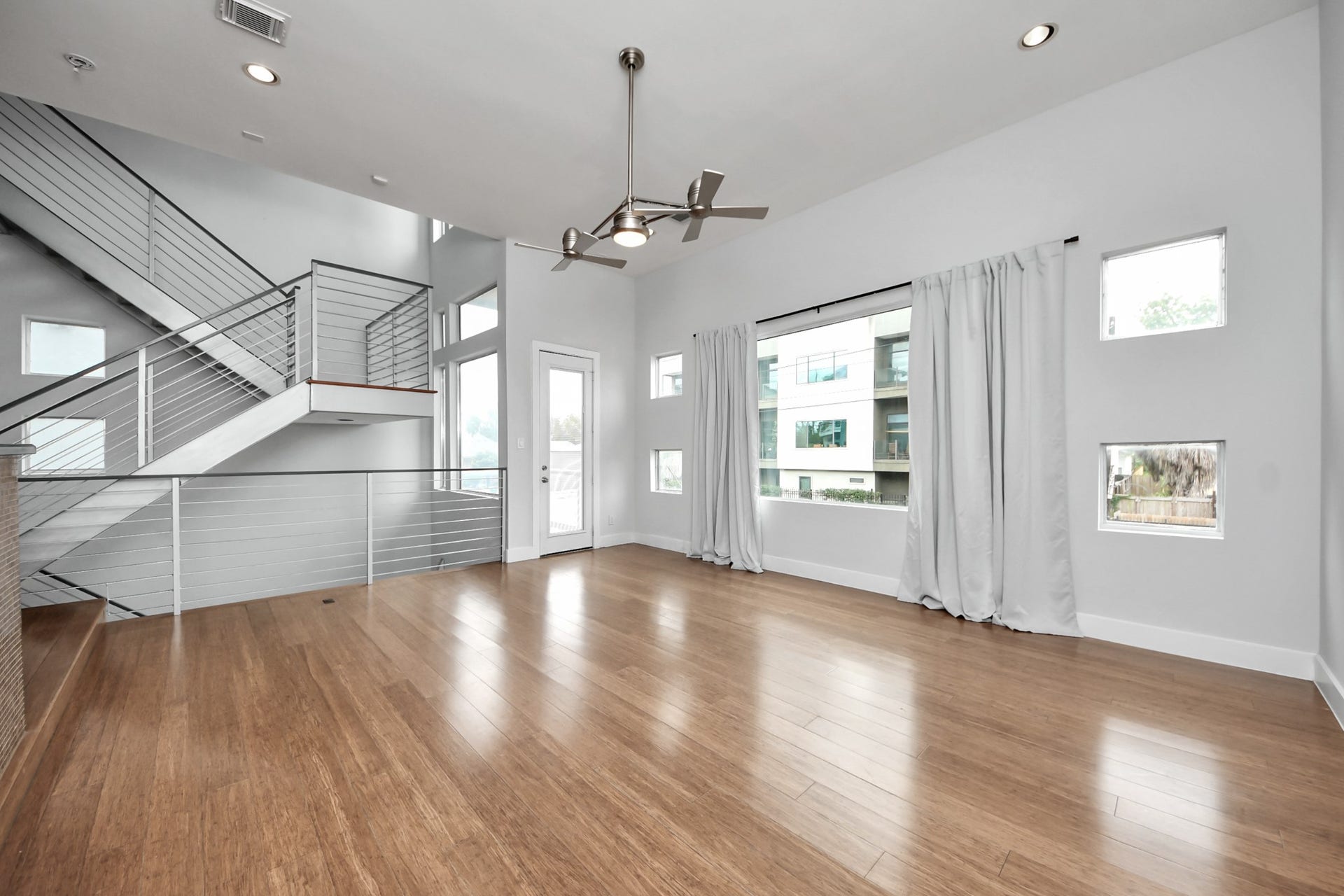 1807 Hickory Street, Houston, TX 77007 Living room area with open floor plan and great natural lighting