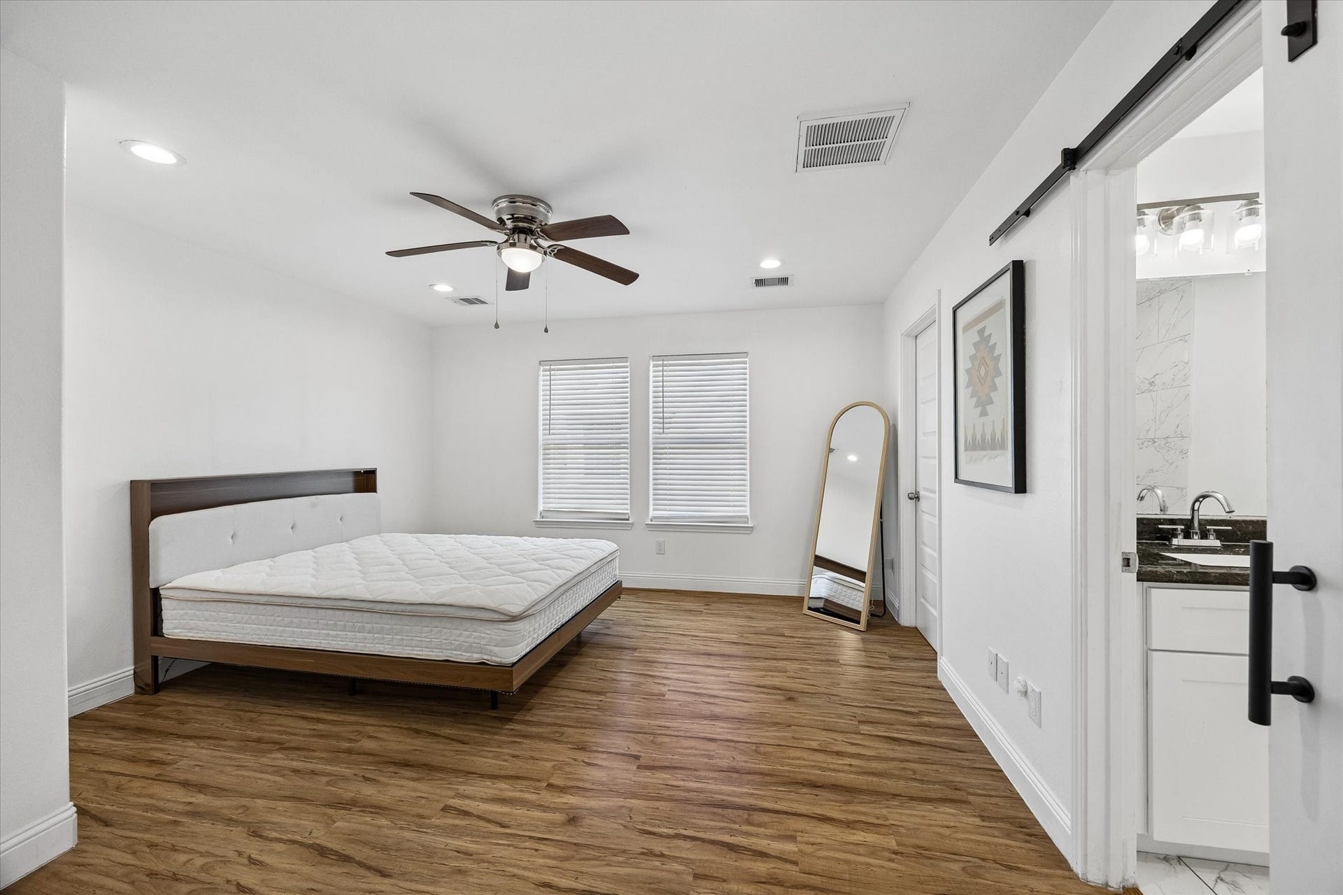 3515 Shelby Circle, #A/B, Houston, TX 77051 The generously sized primary bedroom is separated from the secondary bedrooms allowing for added privacy, an ensuite bathroom with ample counter and storage space, and a great walk-in closet.