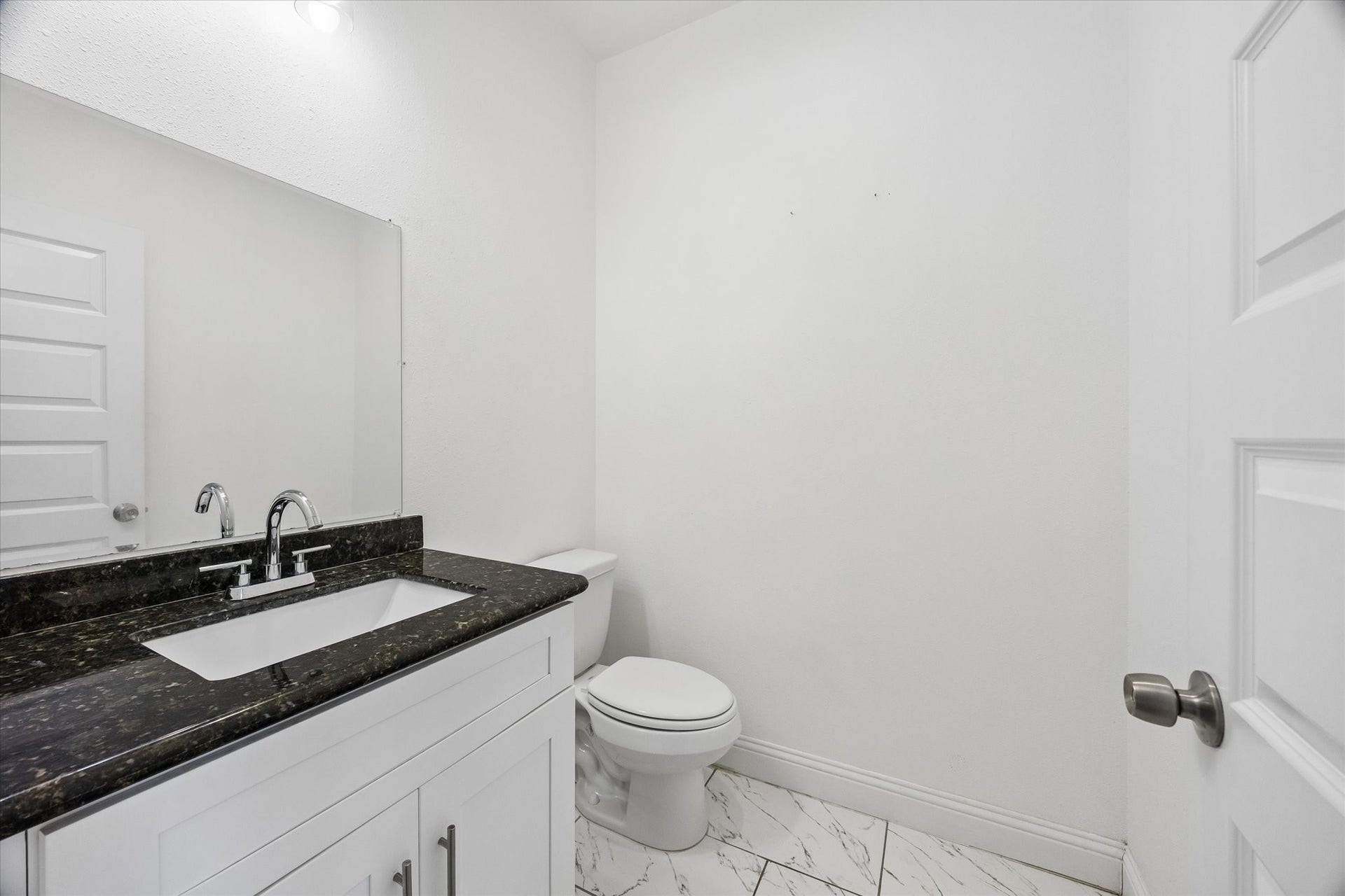 3515 Shelby Circle, #A/B, Houston, TX 77051 The spacious first-floor half bath offers generous counter, storage, and wall space, providing plenty of opportunity for additional storage and personal dcor. More than just a powder bath, the space can be styled to feel like a thoughtful extension of the homes overall design aesthetic.