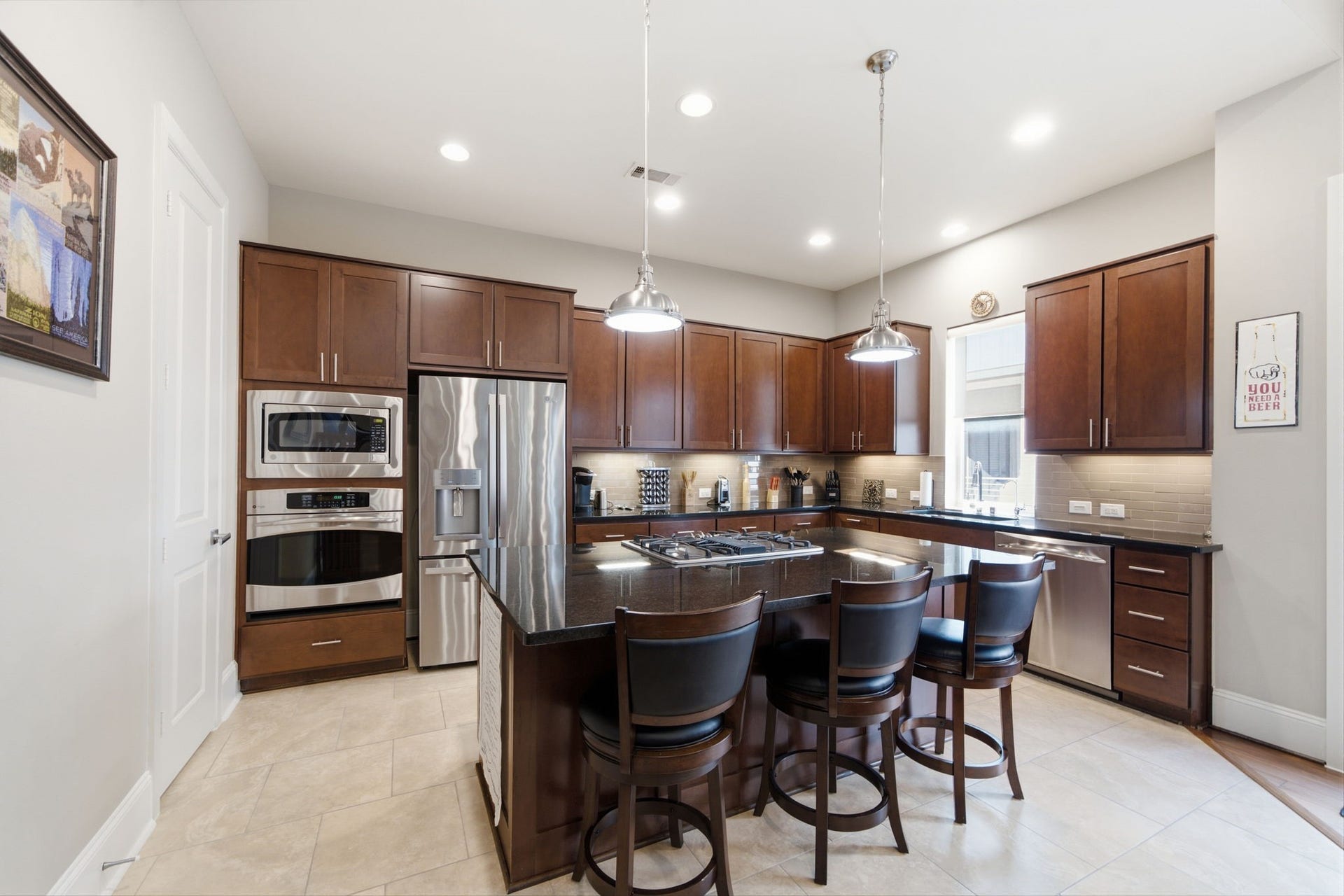 5531 Venice Street, Houston, TX 77007 The chef-inspired kitchen features gleaming stainless steel appliances, granite and countertops, and abundant workspace.