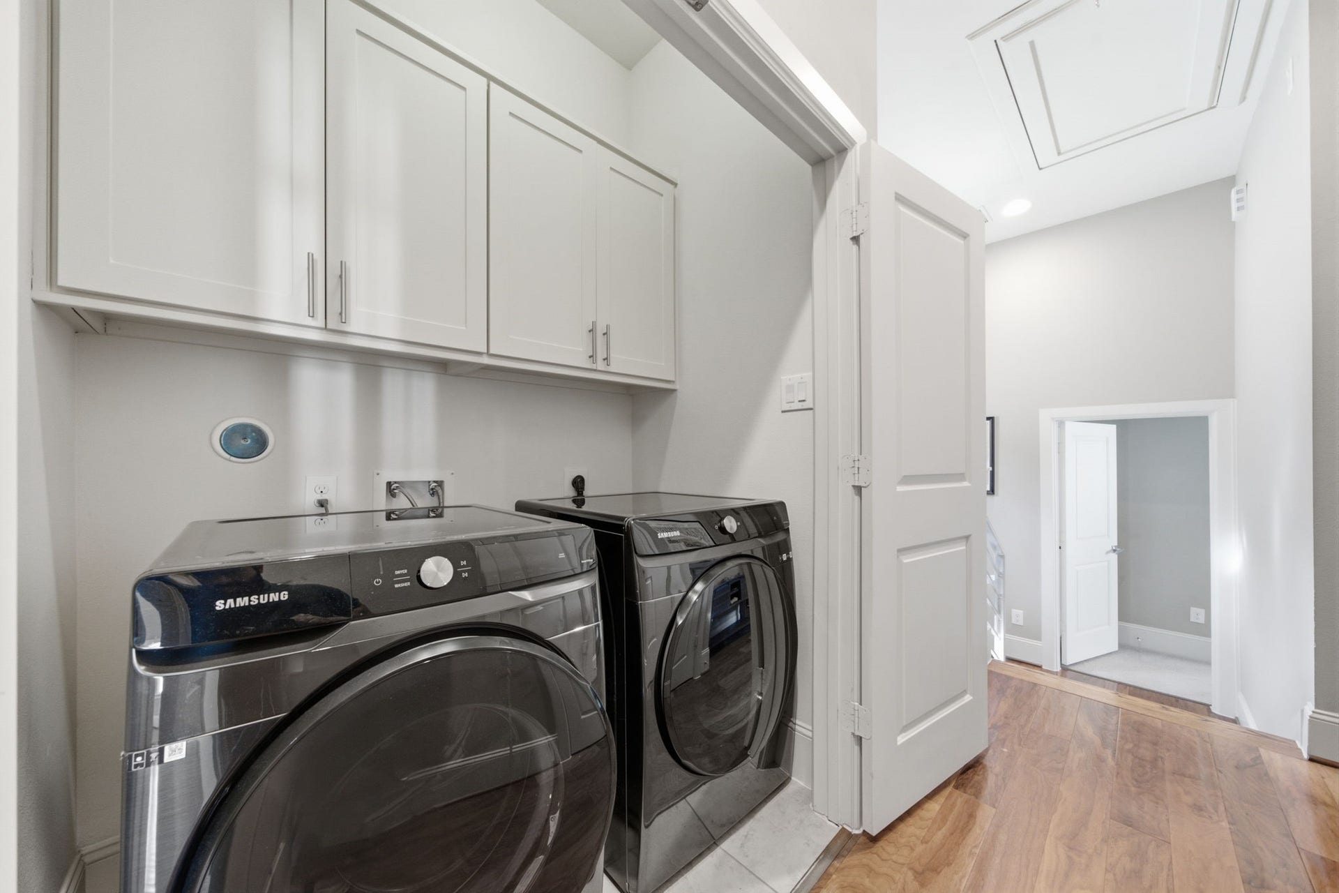 5531 Venice Street, Houston, TX 77007 The dedicated utility space keeps laundry tucked away while remaining easily accessible.