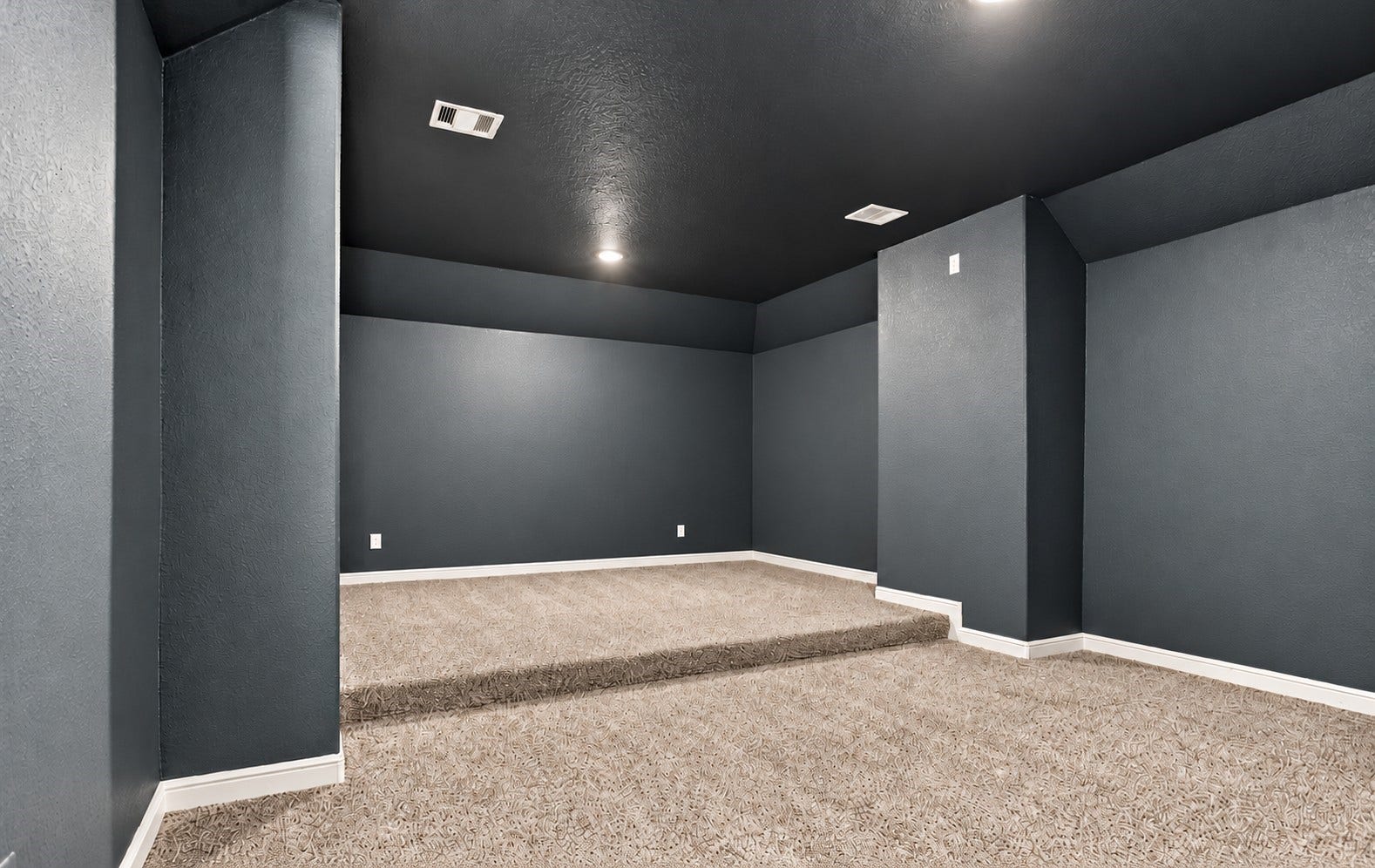 23827 Padauk Tree Trail, Katy, TX 77493 Dedicated media room with tiered risers for two rows of seating, perfect for movie nights and game days!