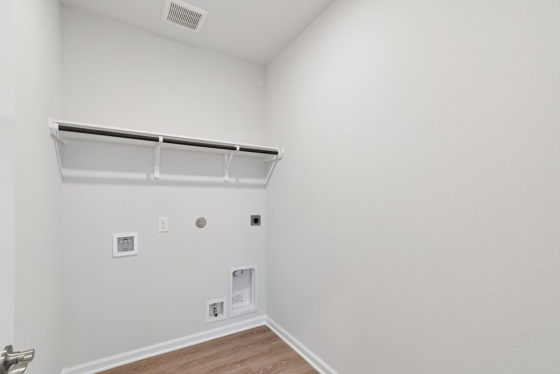 The Oakshire II- Utility Room.  Sample image for illustration; upgrades, options, and colors may vary.