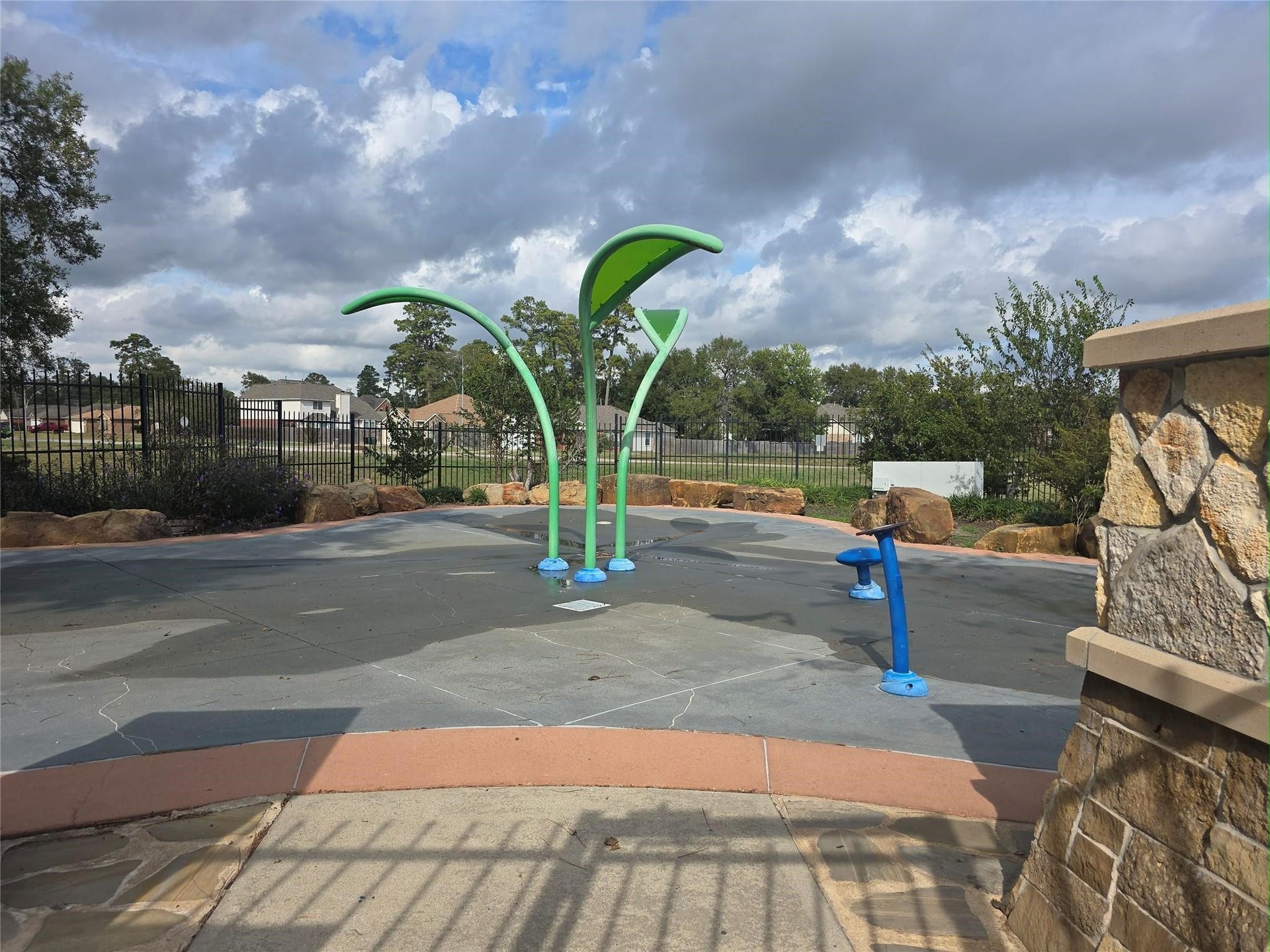Enjoy outdoor fun at this neighborhood splash pad, featuring playful water features and a spacious, fenced setting perfect for families.