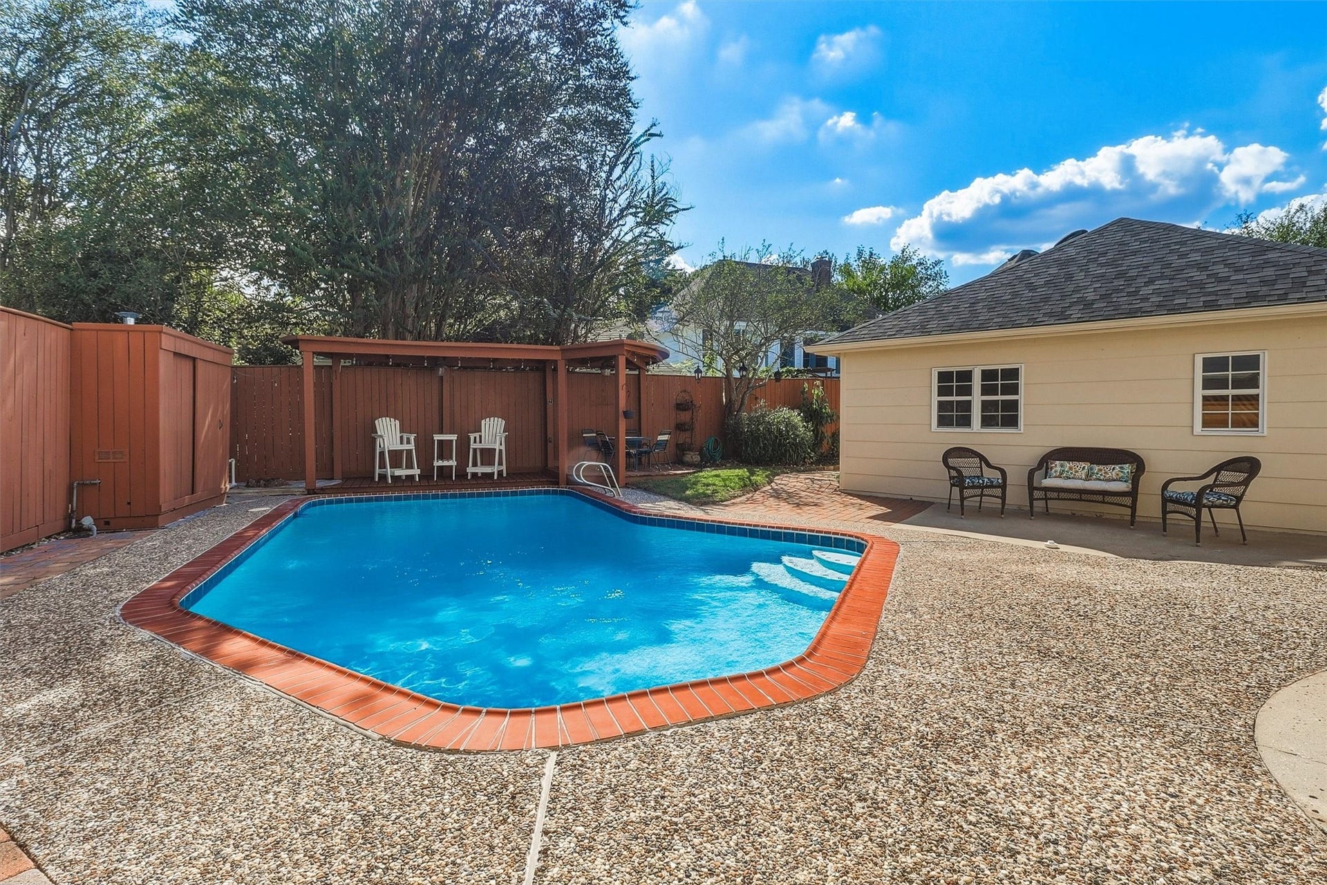 1030 Barkston Drive, Katy, TX 77450 The backyard is anchored by a beautiful heated pool complete with a Catch A Kid safety net, plus the convenience of an outdoor half bathroom nearby, as well as other shaded areas!