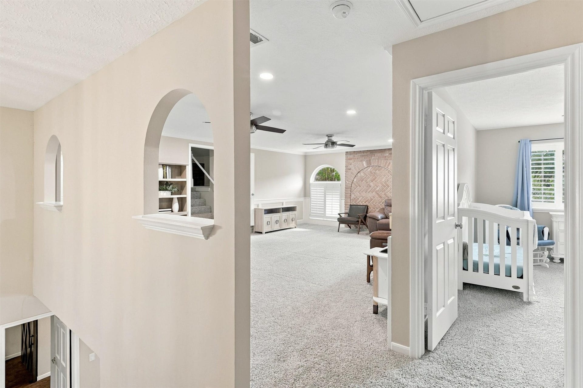 1030 Barkston Drive, Katy, TX 77450 Following the staircase up to the second level of the home, you will find the spacious gameroom, secondary bedrooms, and a versatile bonus room. Be sure to notice the two arched cutouts in the sheetrock, adding wonderful character to the home.
