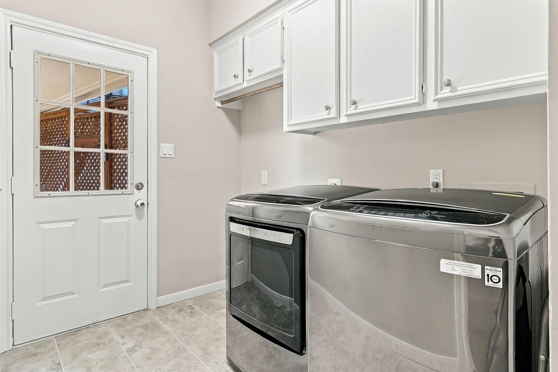 1030 Barkston Drive, Katy, TX 77450 The utility room offers plenty of room for your washer, dryer, and even a refrigerator if needed. Built in cabinetry provides the perfect spot for storing cleaning supplies and detergents.
