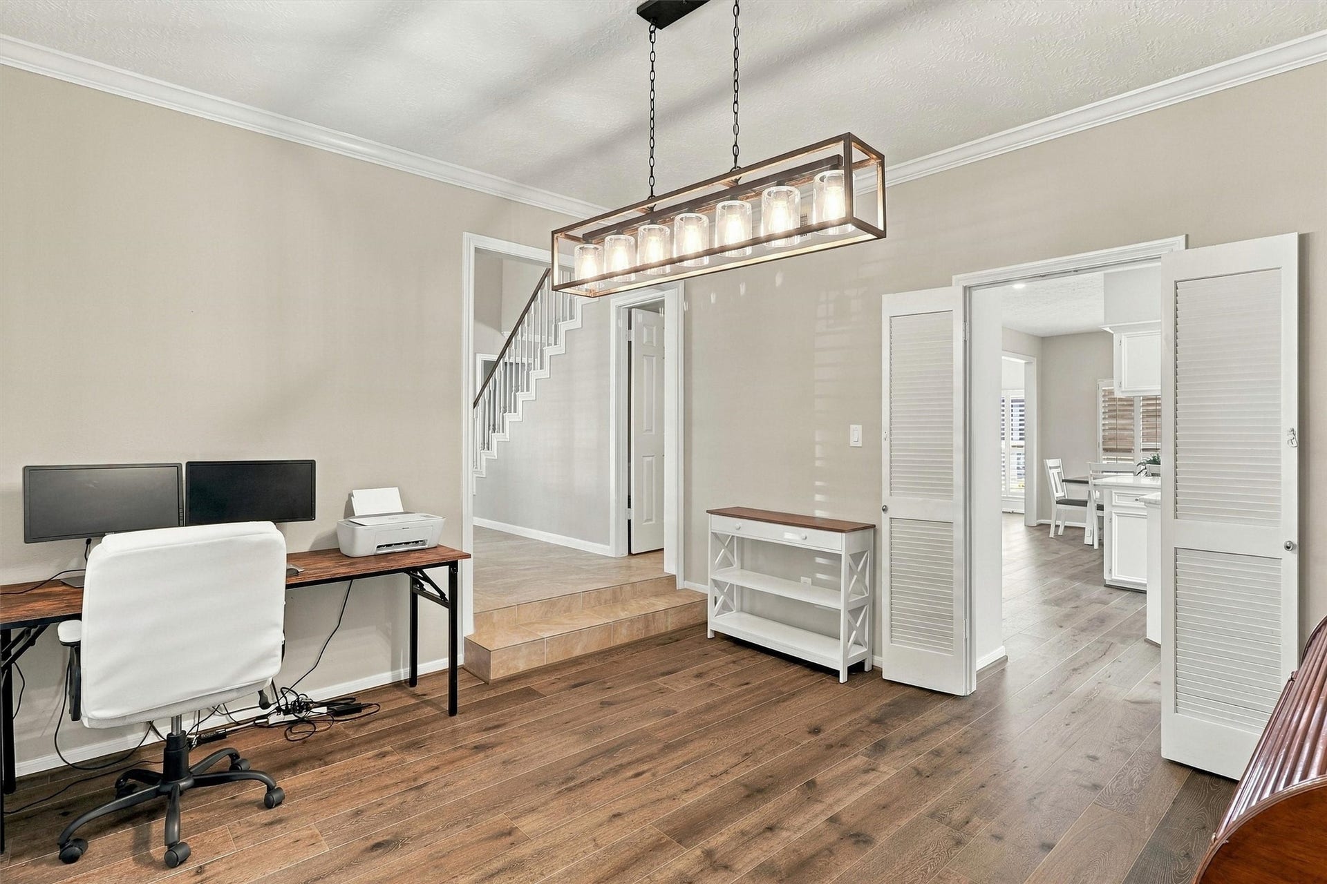 1030 Barkston Drive, Katy, TX 77450 An alternate view of the dining area highlights its convenient access to the kitchen and front foyer. This versatile space offers plenty of room to suit your needs, whether as a playroom, home office, or formal dining room.